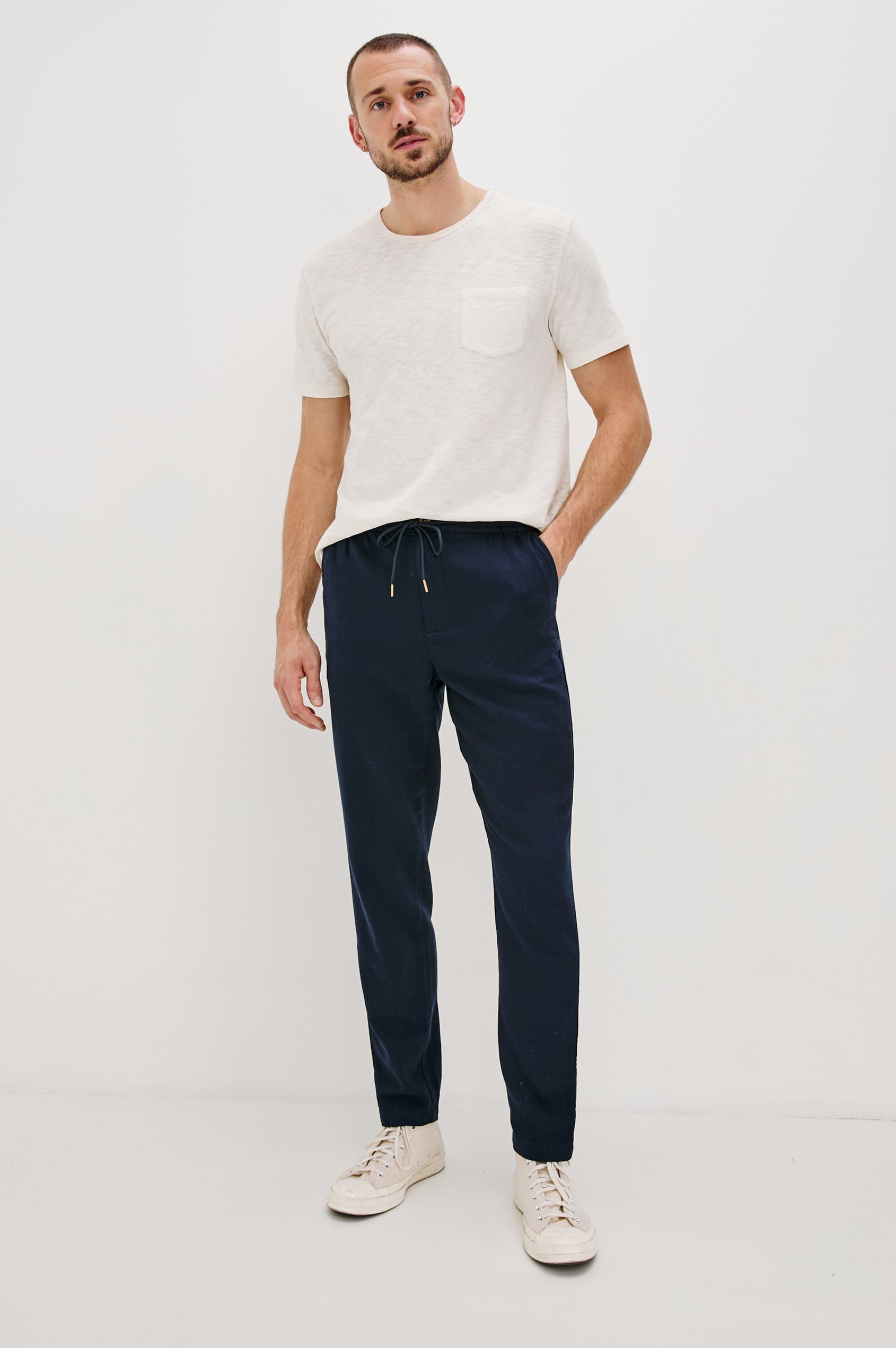 Callum extended length linen straight leg pant with elastic waistband and adjustable drawstring in Deep Meridian - full body front view on model