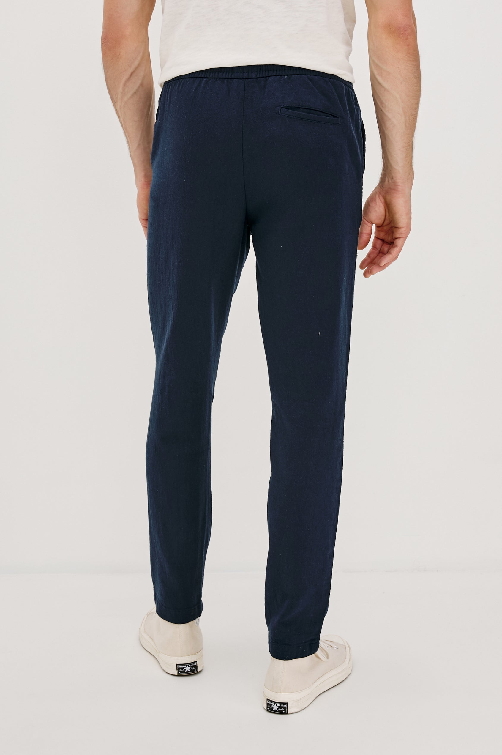 Callum extended length linen straight leg pant with elastic waistband and adjustable drawstring in Deep Meridian - back view on model