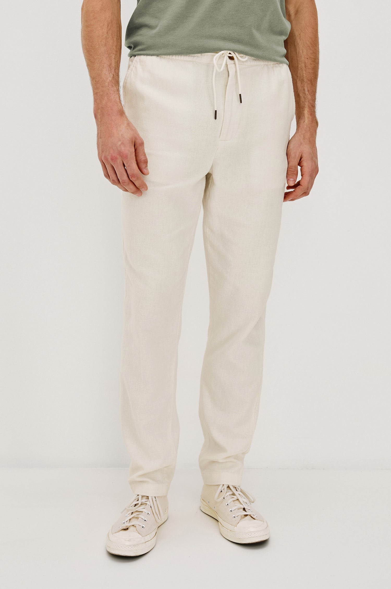 Callum extended length linen straight leg pant with elastic waistband and adjustable drawstring in Ecru - front view on model