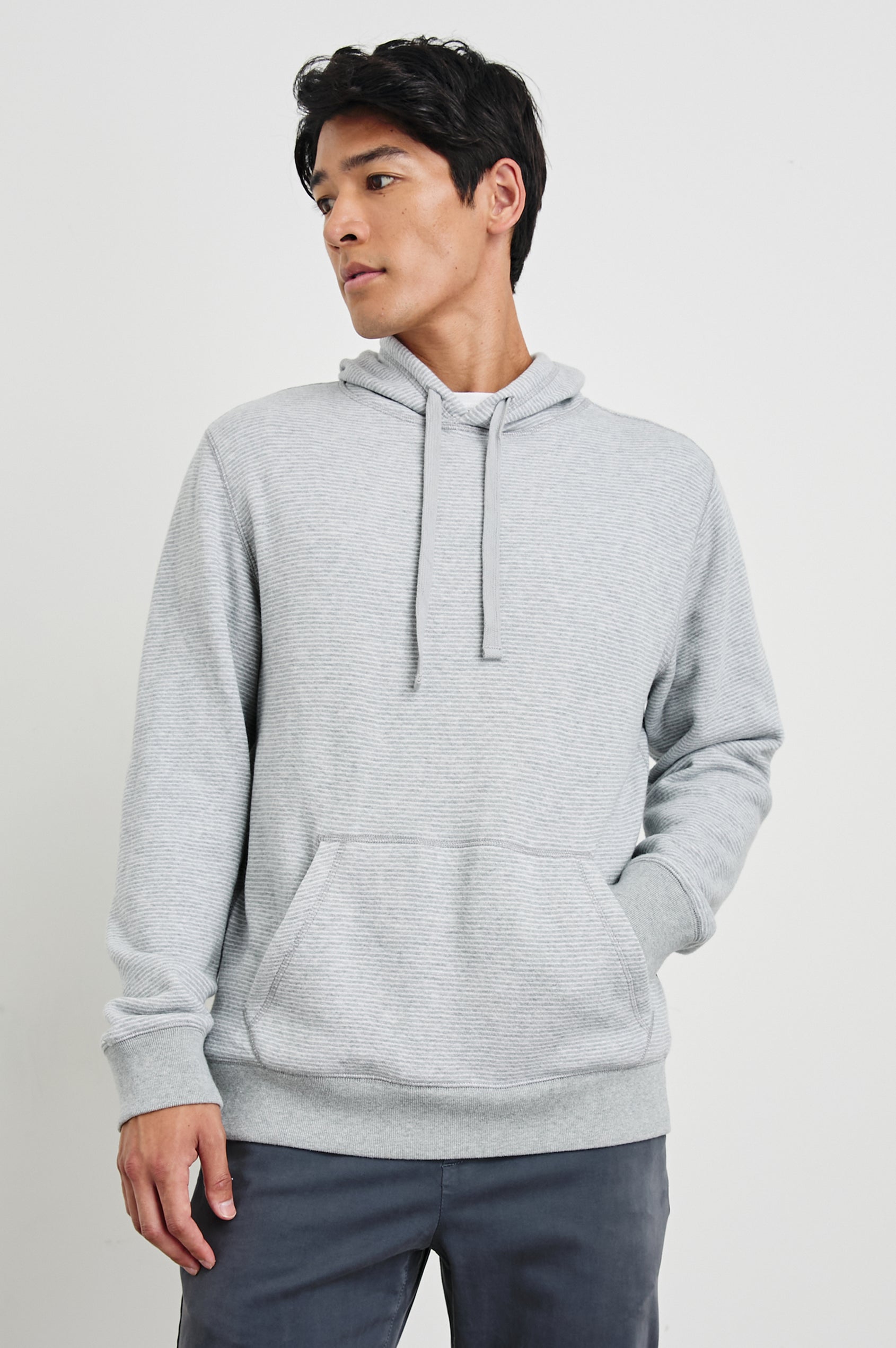 Calvin Long-Sleeve Hoodie with a Drawstring Hood and a Kangaroo Pocket in Heather Cream Stripe Colorway, Horizontal Stripes - Front View Featured on Model 