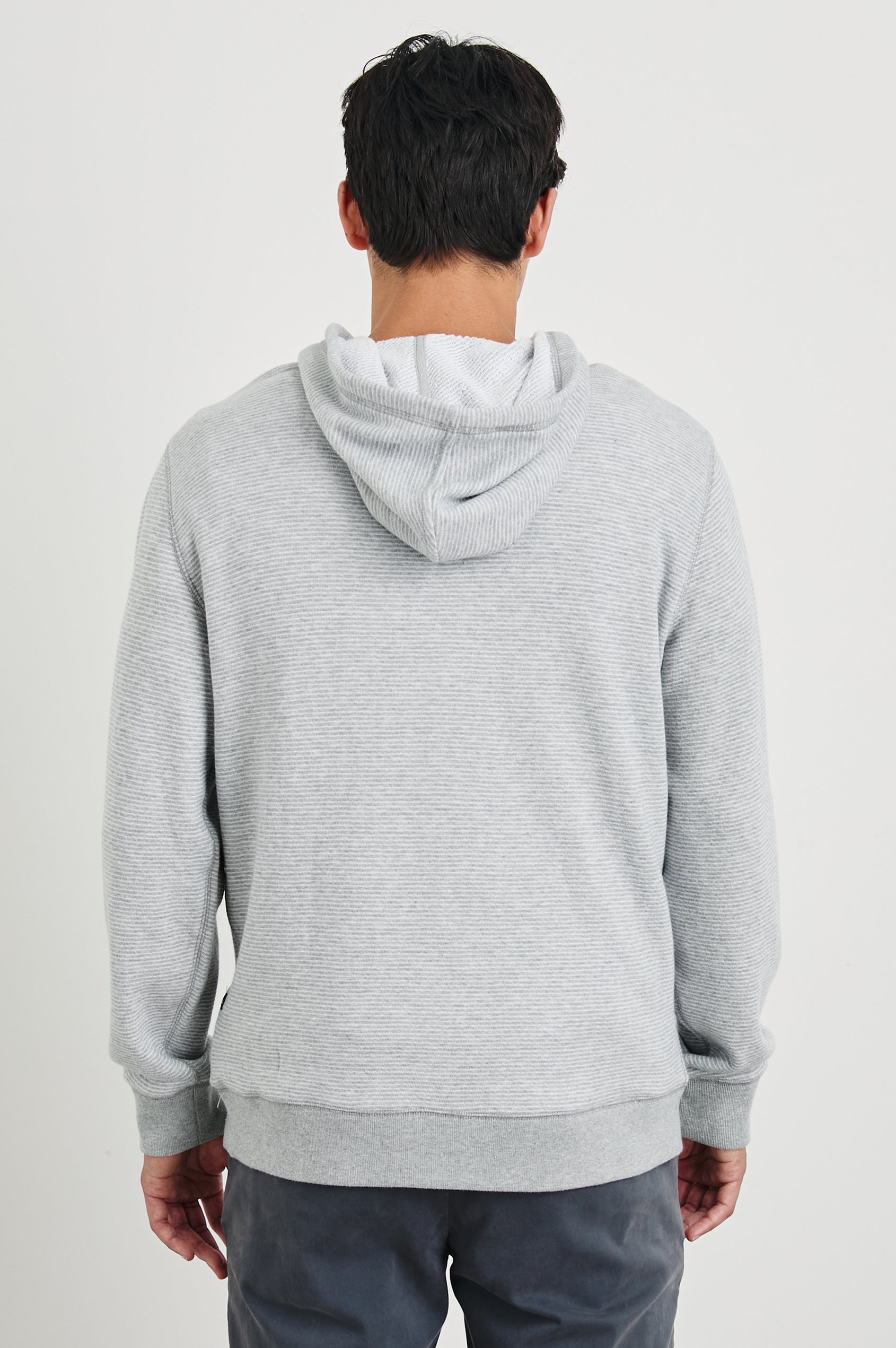 Calvin Long-Sleeve Hoodie with a Drawstring Hood and a Kangaroo Pocket in Heather Cream Stripe Colorway, Horizontal Stripes - Back View Featured on Model 