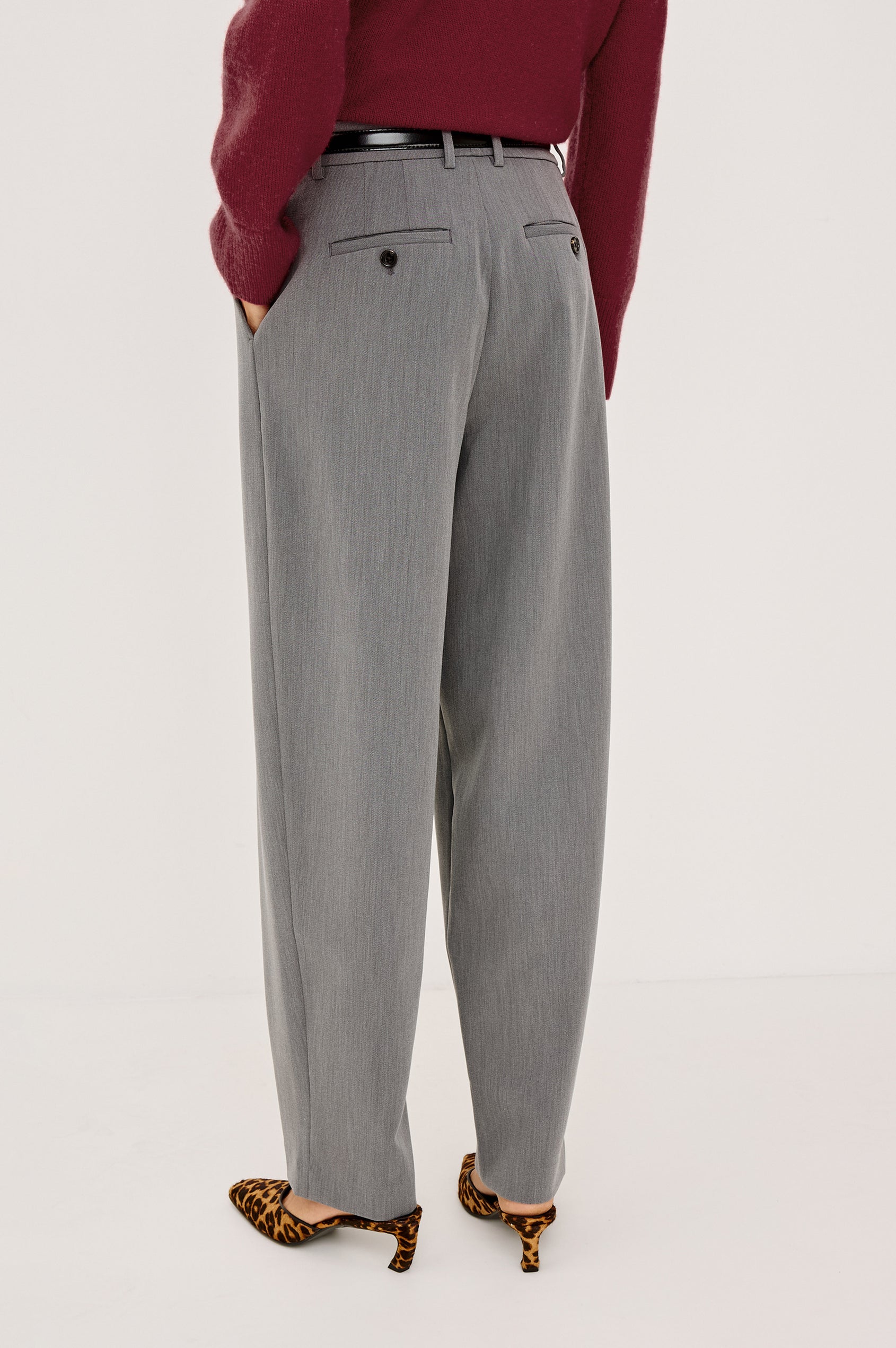 Cameron Pant in Springy Suiting Fabric With High-Rise, Pleated Barrel Legs That Taper, Side and Back Pockets, and Unlined in Heather Grey Colorway - Lower Body Back View Featured on Model