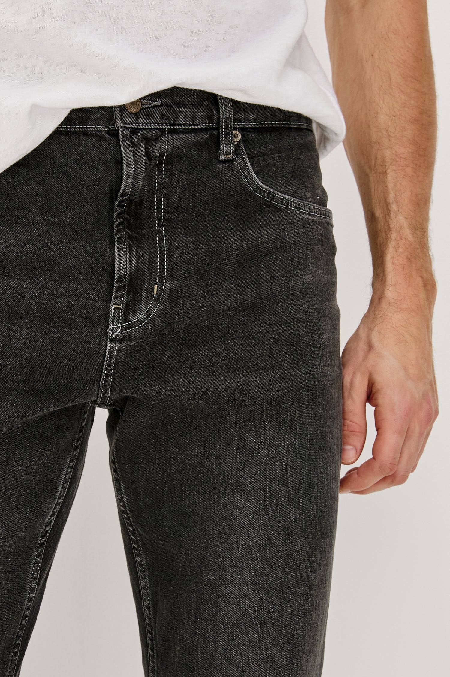 Clayton Slim Straight Jeans with Belt Loops, Two Front Pockets plus a Coin Pocket and Two Back Patch Pockets in Reever 5 Year Colorway, a Washed Black - Front View Featured on Model