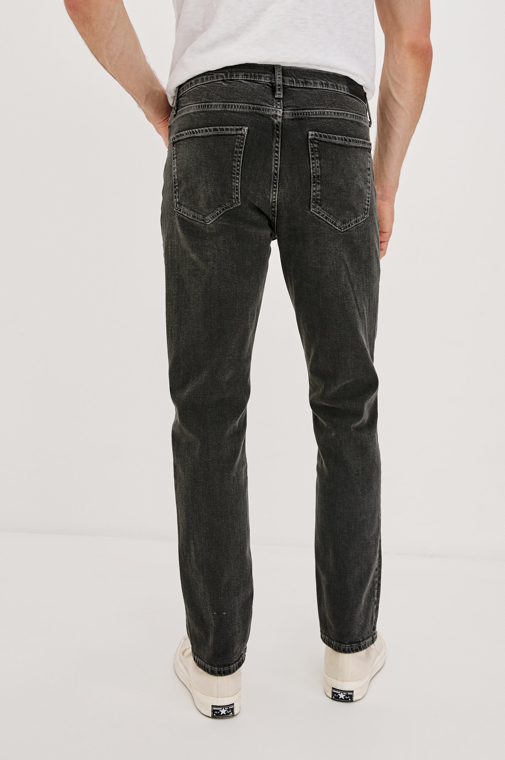 Clayton Slim Straight Jeans with Belt Loops, Two Front Pockets plus a Coin Pocket and Two Back Patch Pockets in Reever 5 Year Colorway, a Washed Black - Back Full Body View Featured on Model
