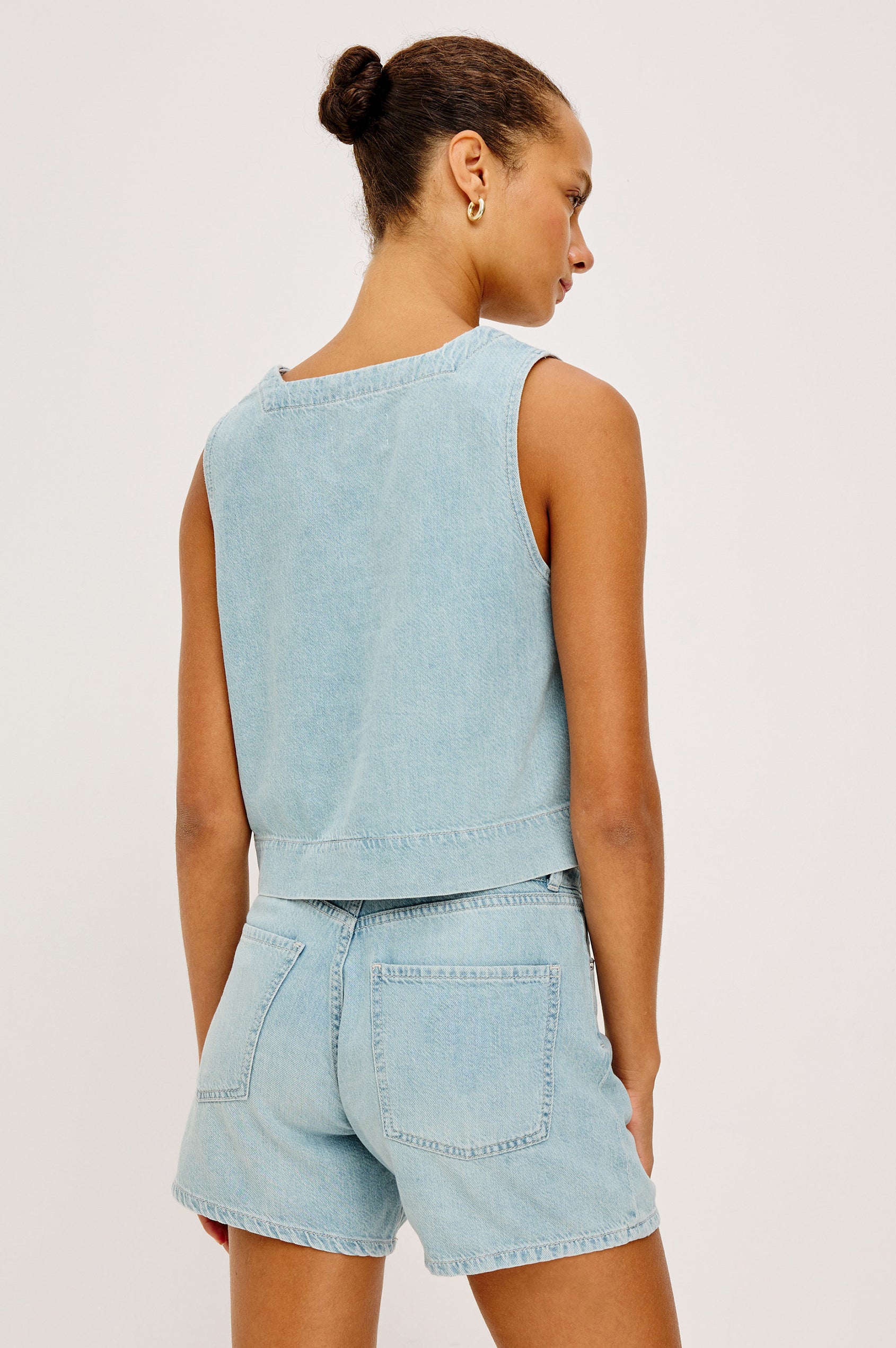Carbon Crop Tank Top in Cotton Lyocell Denim With Square Neckline, Wide Shoulder Straps, and a Loose, Boxy Fit in Surf Colorway - Upper Body Back View Featured on Model