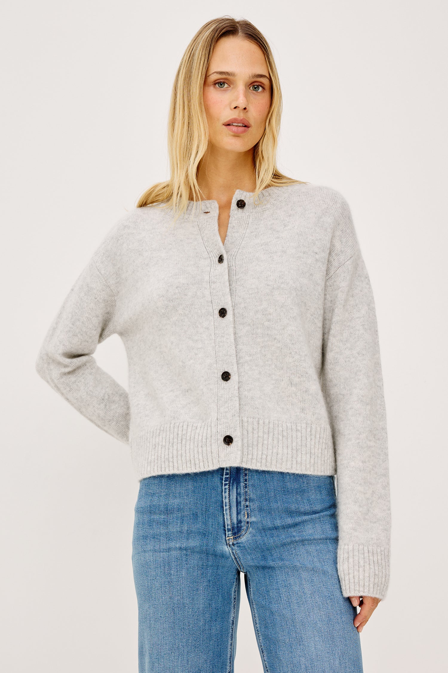 Carre Cardigan in Wool-Cashmere Knit Blend, Relaxed Slightly Boxy Fit, Crew Neckline, Front Buttons, Long Sleeves, and Ribbed Trim in Heather Grey Colorway - Upper Body Front View Featured on Model