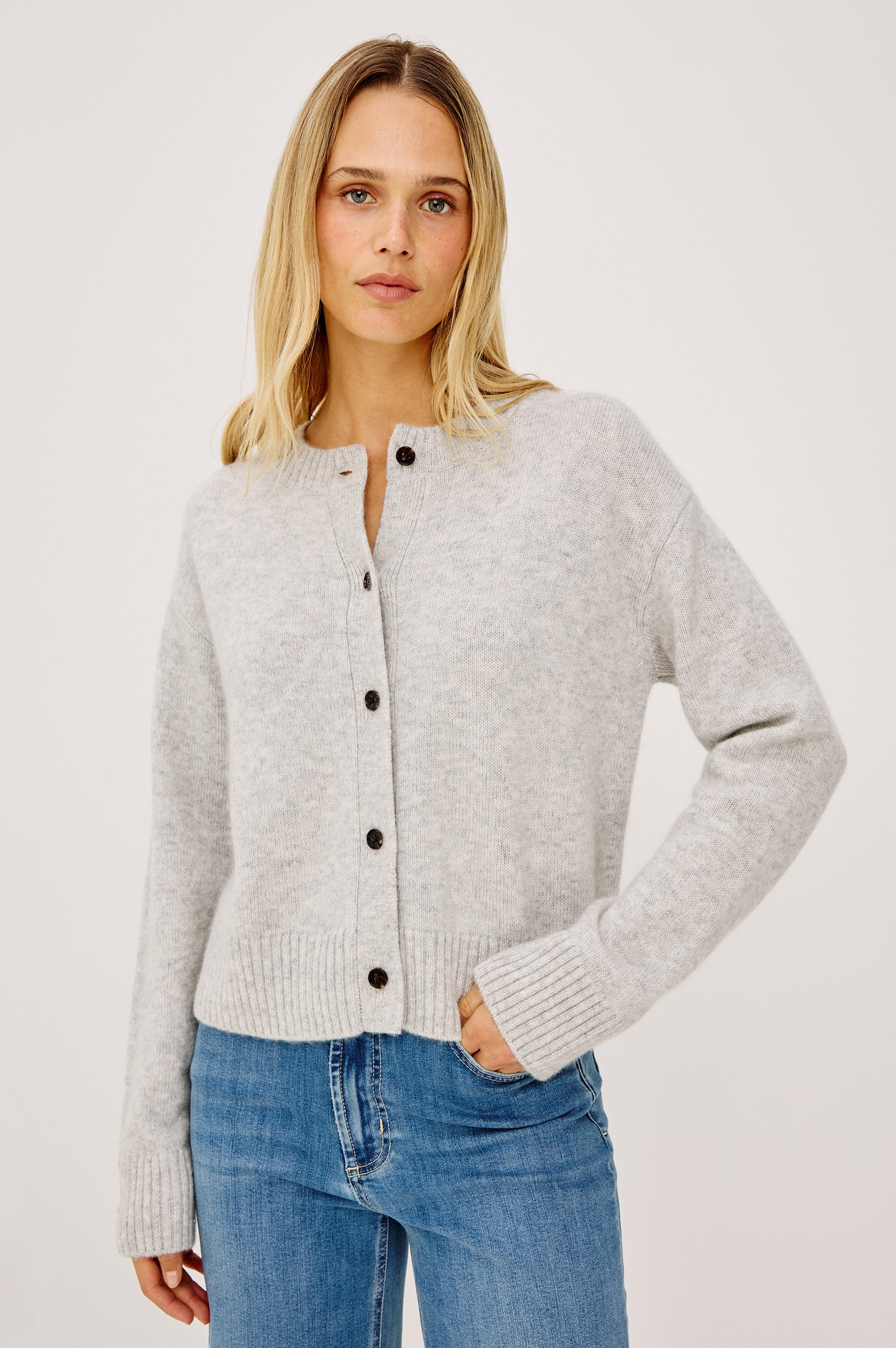 Carre Cardigan in Wool-Cashmere Knit Blend, Relaxed Slightly Boxy Fit, Crew Neckline, Front Buttons, Long Sleeves, and Ribbed Trim in Heather Grey Colorway - Upper Body Front View Featured on Model