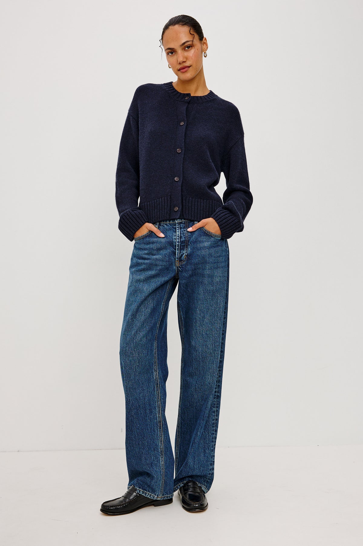 Carre Cardigan in Wool-Cashmere Blend With Relaxed Slightly Boxy Fit, Crew Neckline, Front Buttons, Long Sleeves, and Chunky Rib Trim in Navy Colorway - Full Body Front View Featured on Model