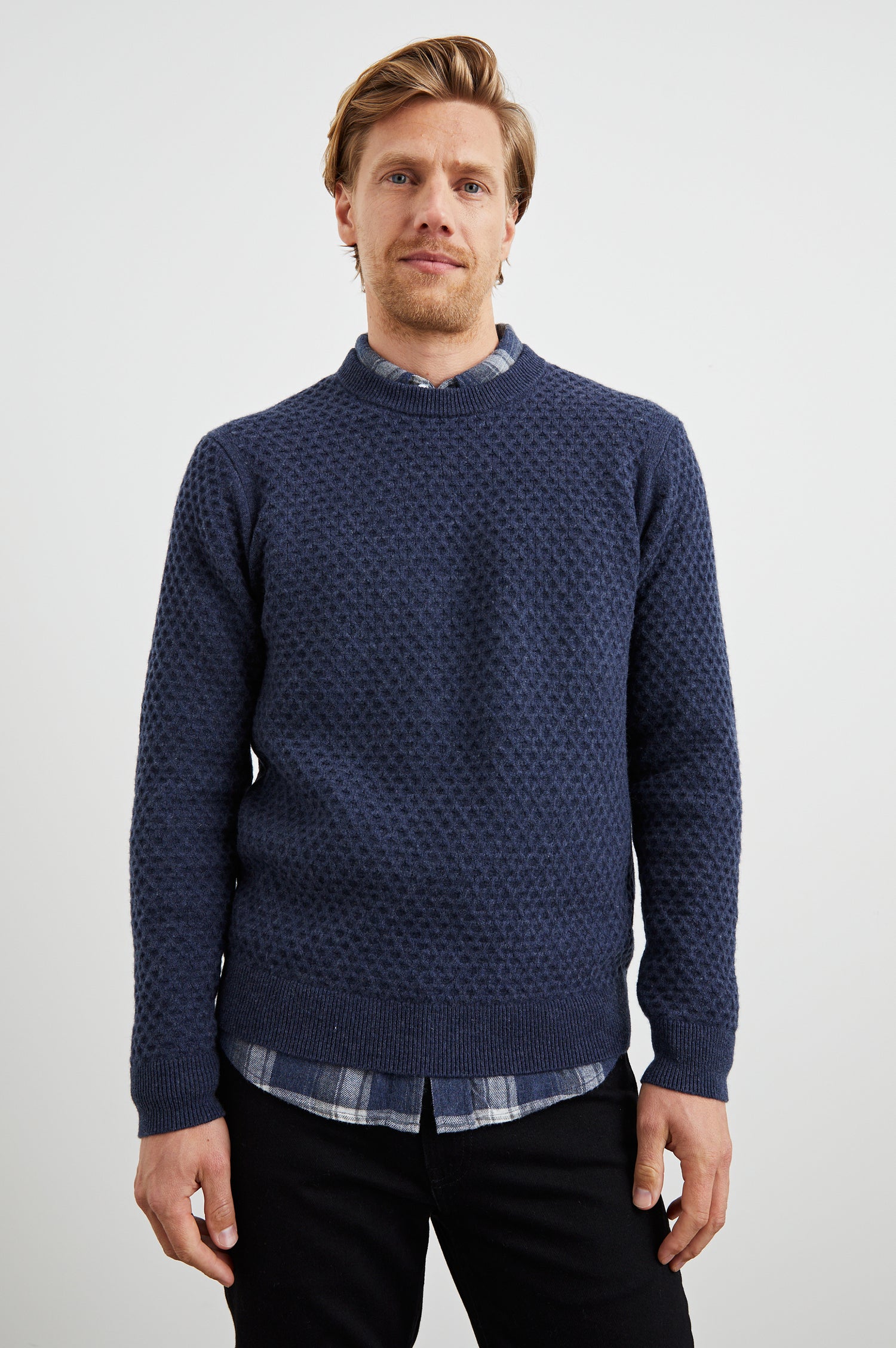 Carrick Long-Sleeve Sweater with a Crew Neck, Honeycomb Stitch, and Ribbed Trim in Navy Heather Colorway - Front View Featured on Model