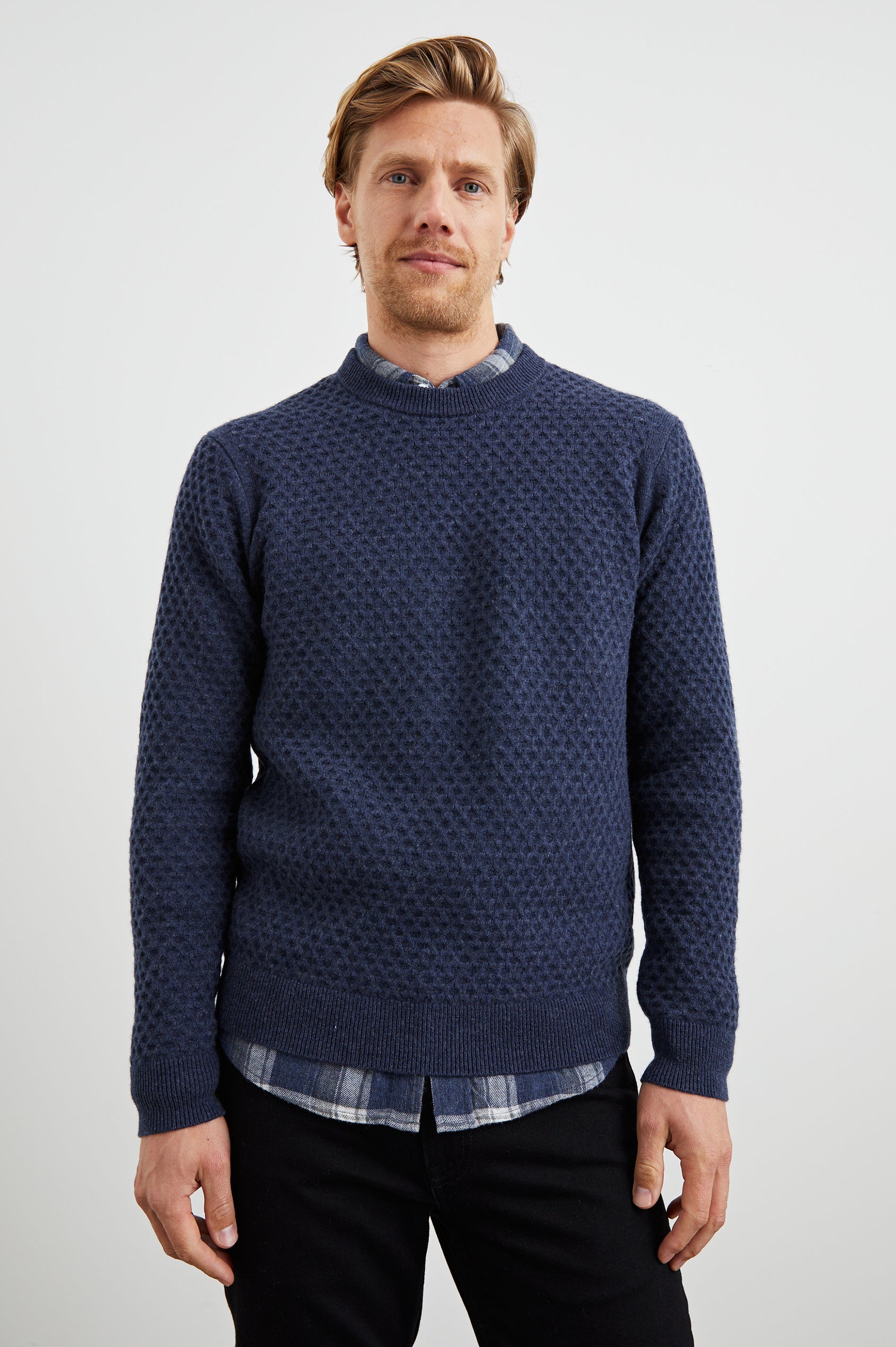 Carrick Long-Sleeve Sweater with a Crew Neck, Honeycomb Stitch, and Ribbed Trim in Navy Heather Colorway - Front View Featured on Model