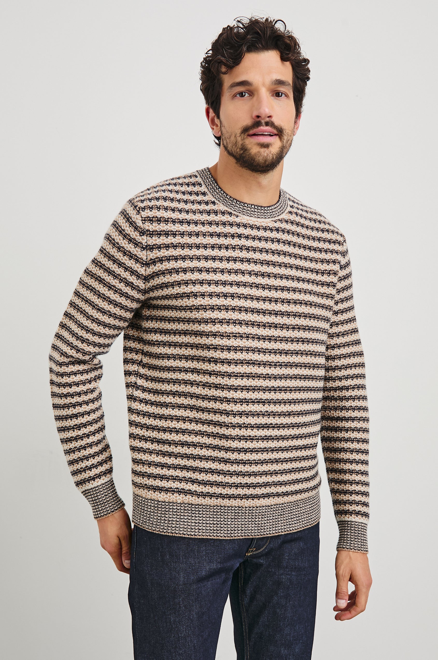 Carrick Long-Sleeve Sweater with a Crew Neck, Honeycomb Stitch, and Ribbed Trim in Navy Oat Stripe Colorway, Horizontal stripes - Front View Featured on Model