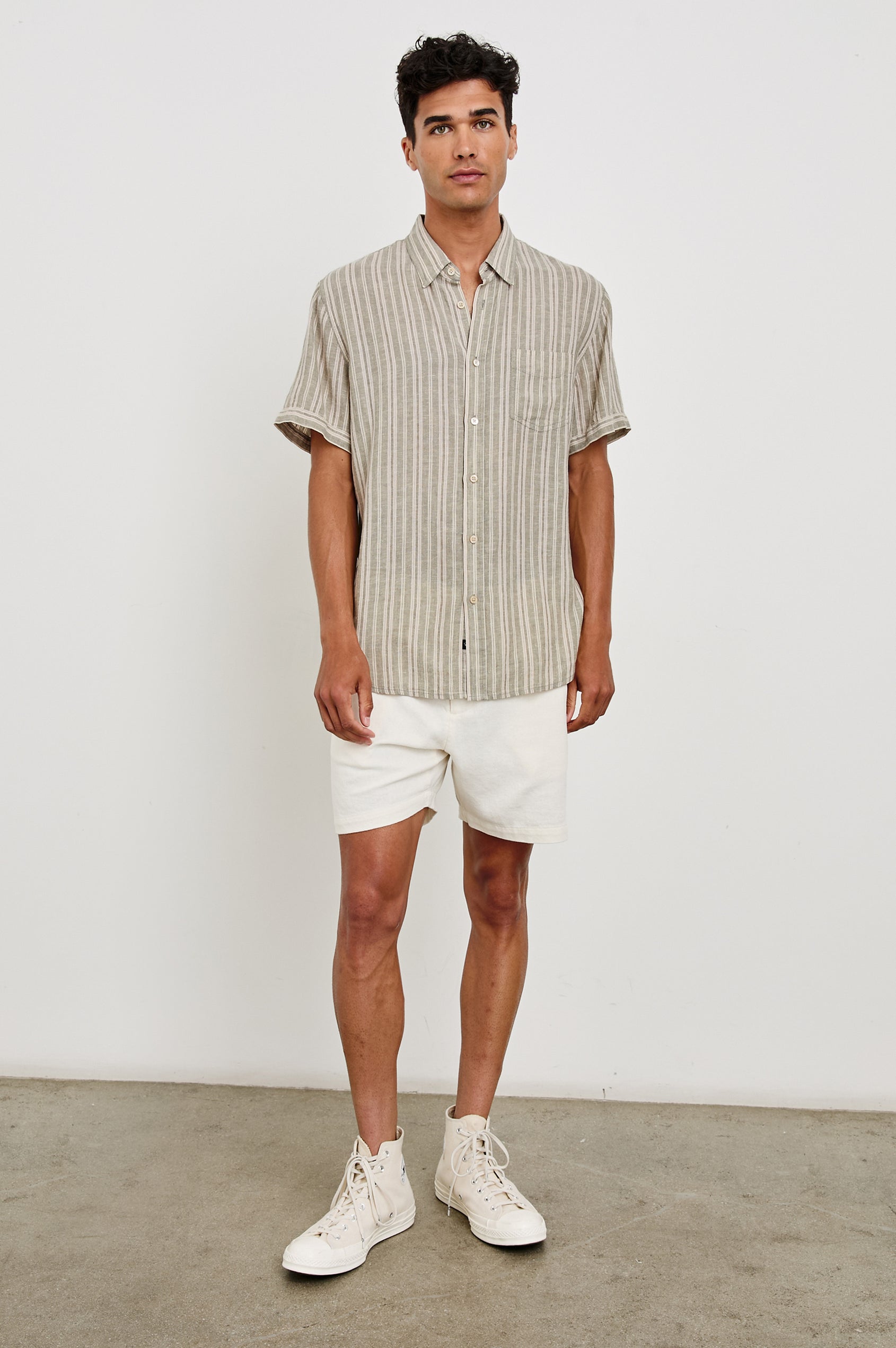 Carson linen short sleeve button down with a collar and neutral textured stripe pattern in Almond Mauve Stripe - full body front view on model