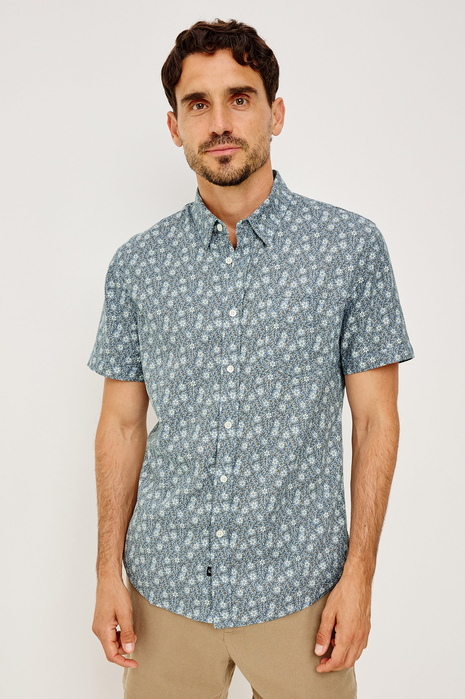 Carson Button-Up Shirt in Linen Blend With Collar, Short Sleeves, Chest Patch Pocket, and Classic Fit in Botanic Batik Crystal Colorway - Upper Body Front View Featured on Model