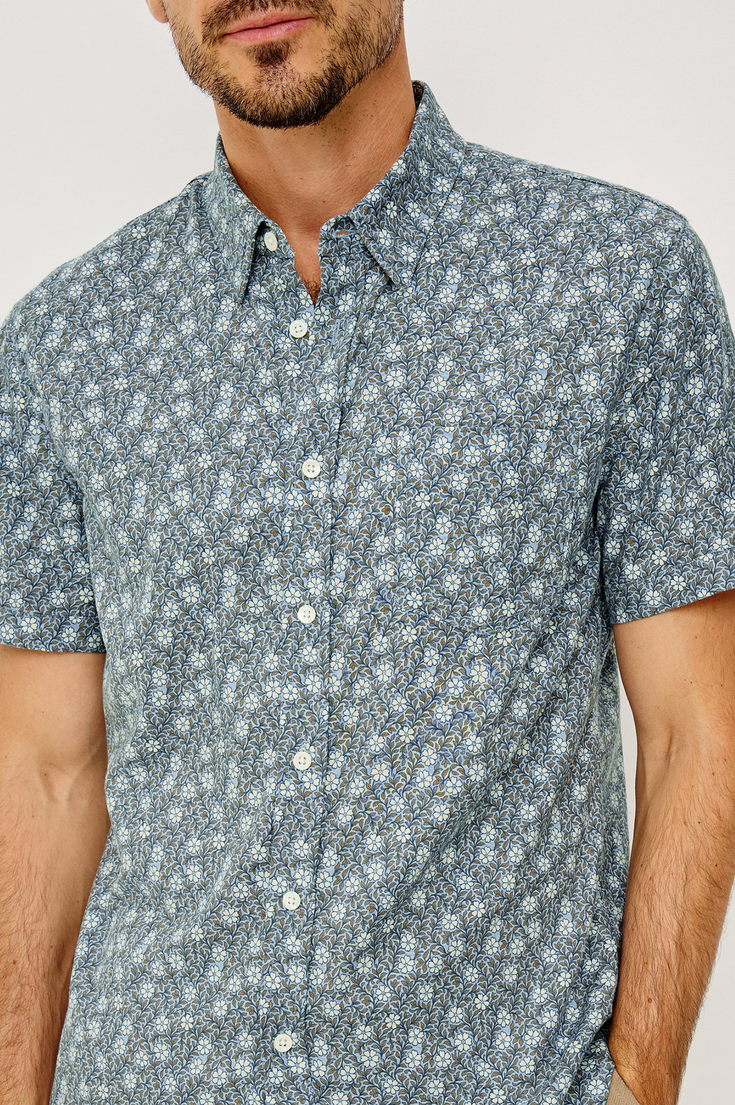 Carson Button-Up Shirt in Linen Blend With Collar, Short Sleeves, Chest Patch Pocket, and Classic Fit in Botanic Batik Crystal Colorway - Upper Body Front View Featured on Model