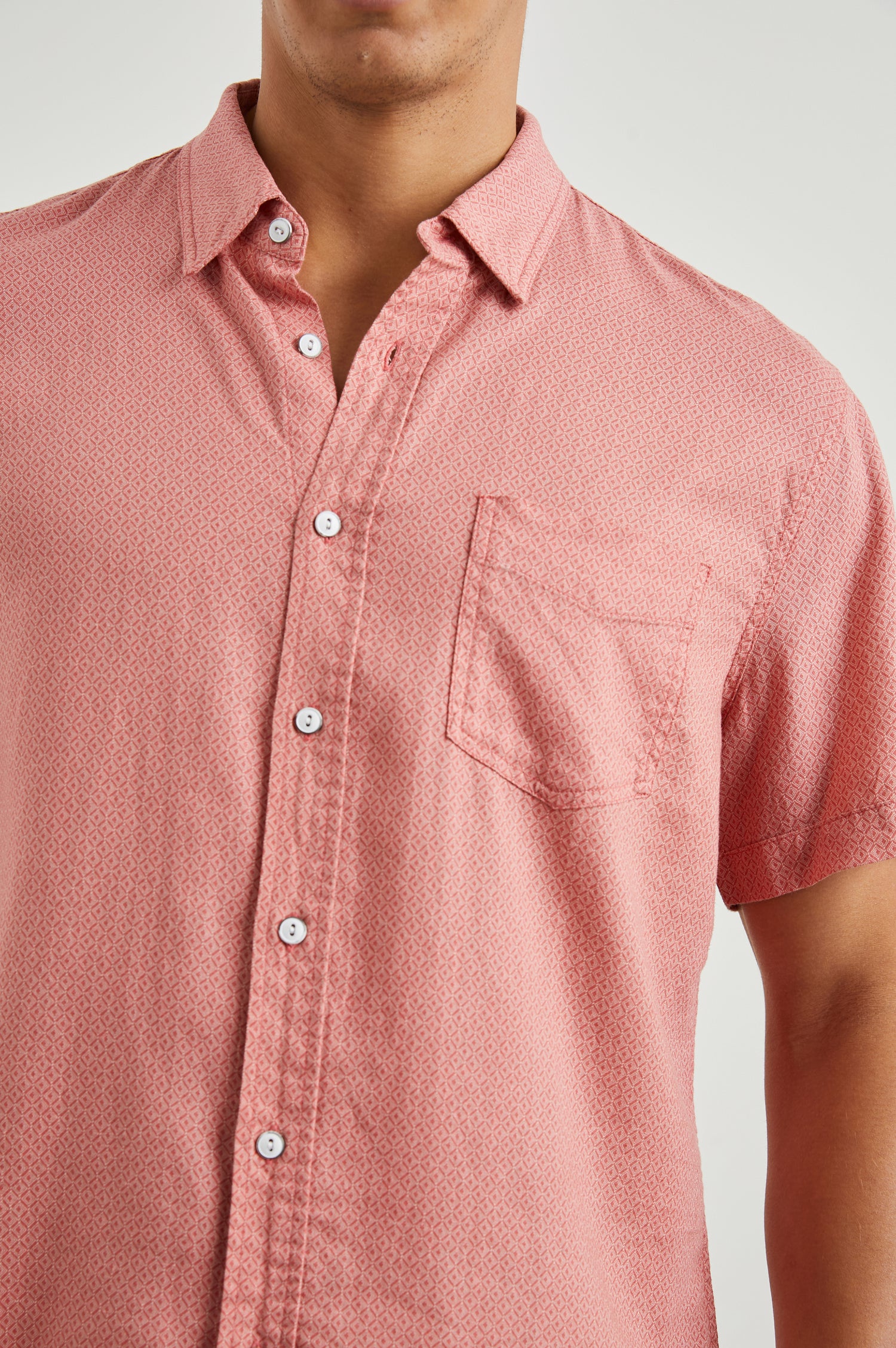 Carson Short Sleeve Button Up with a Chest Patch Pocket in Crown Jewel Ruby Colorway, with a Small Diamond Pattern - Front View Featured on Model