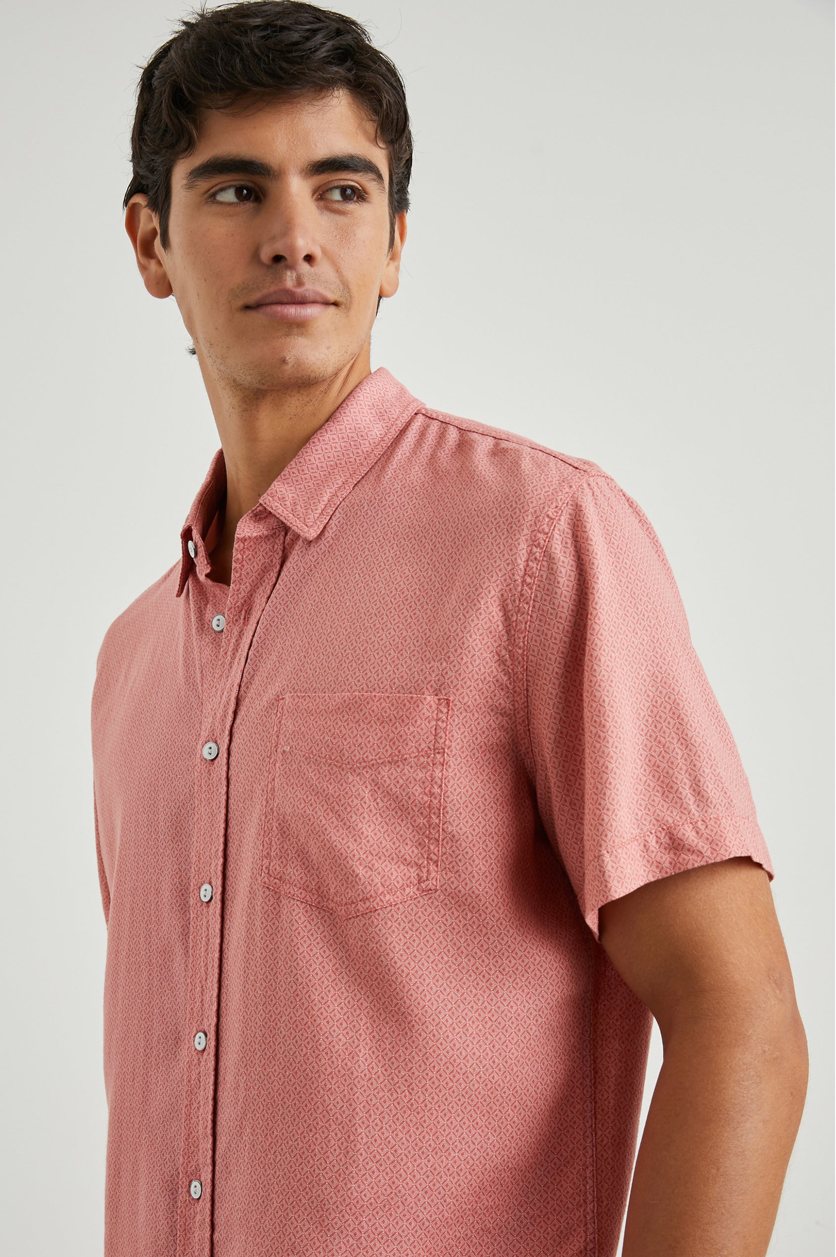 Carson Short Sleeve Button Up with a Chest Patch Pocket in Crown Jewel Ruby Colorway, with a Small Diamond Pattern - Front View Featured on Model