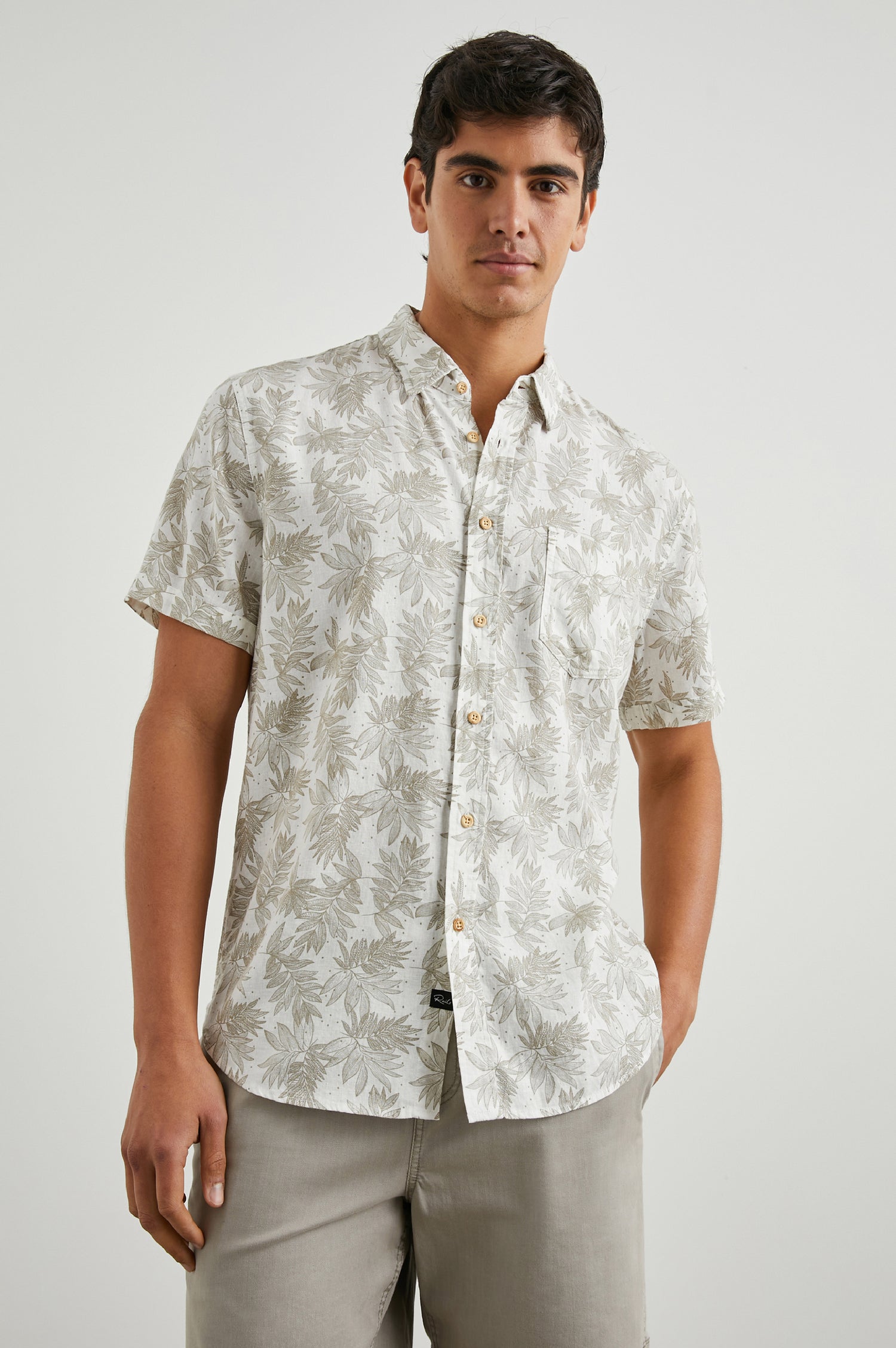 Carson Short Sleeve Button Up with a Chest Patch Pocket in Dotted Fronds Seneca Colorway, on White - Front View Featured on Model