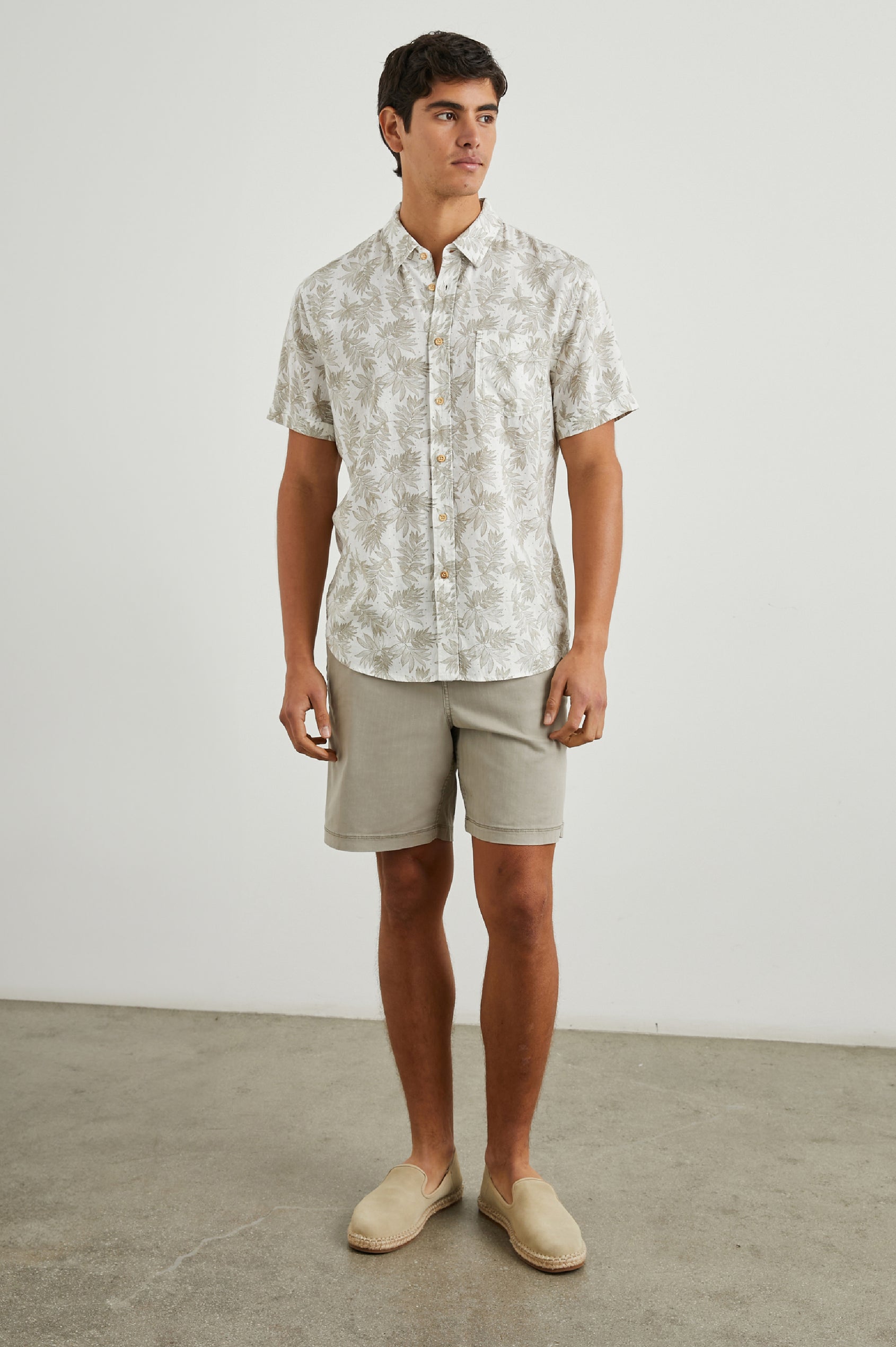 Carson Short Sleeve Button Up with a Chest Patch Pocket in Dotted Fronds Seneca Colorway, on White - Front Full Body View Featured on Model