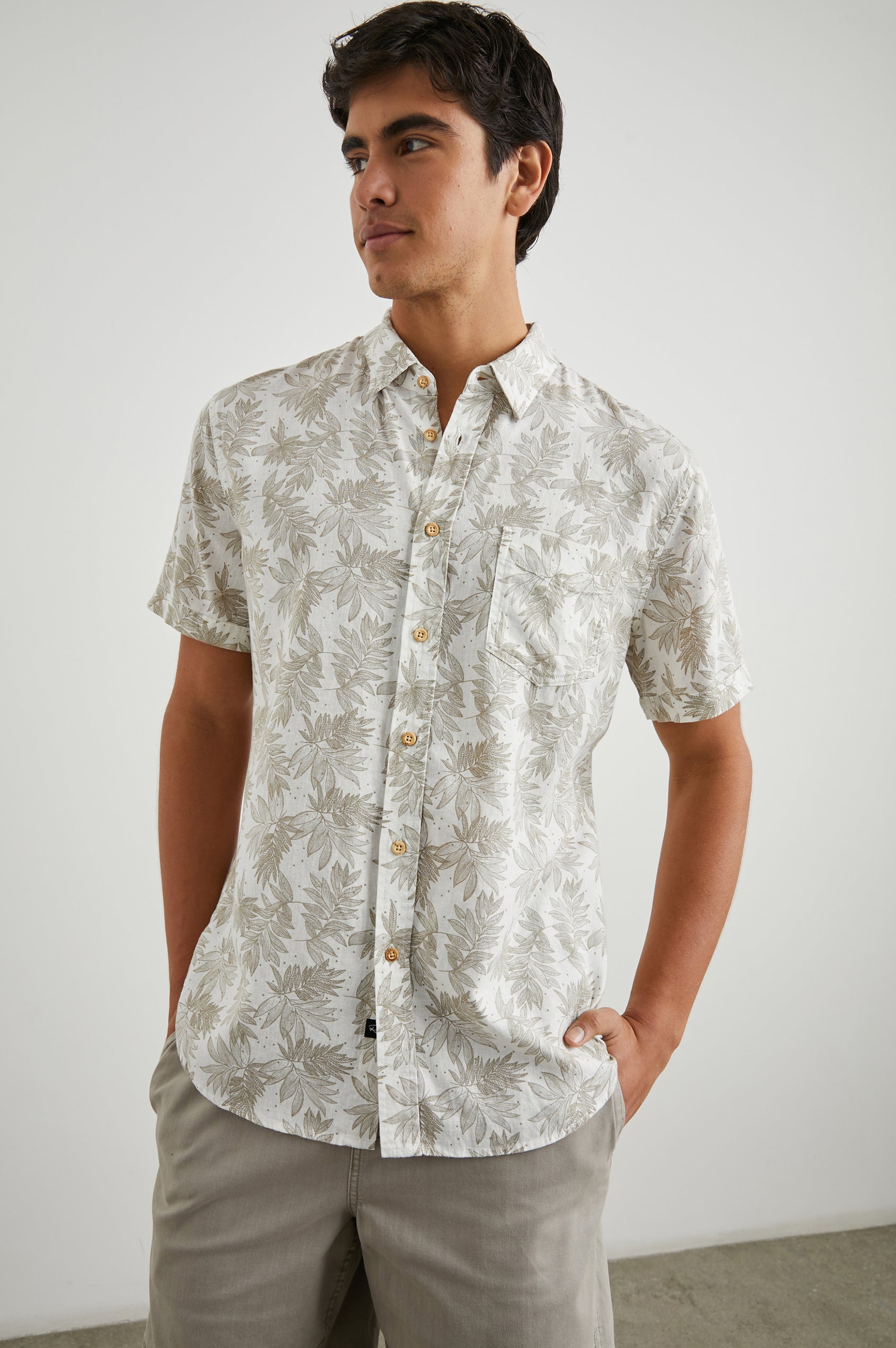 Carson Short Sleeve Button Up with a Chest Patch Pocket in Dotted Fronds Seneca Colorway, on White - Front View Featured on Model
