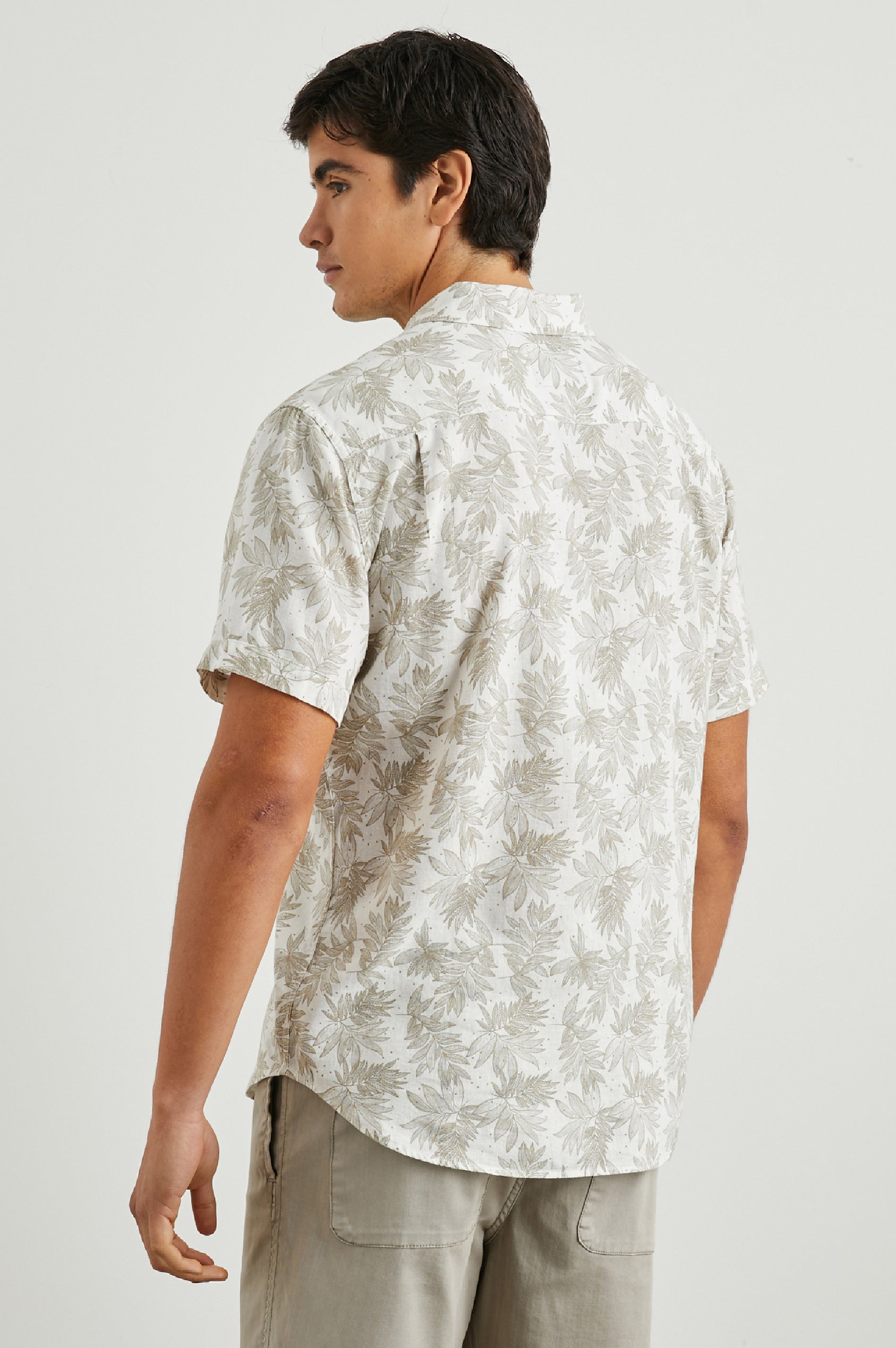 Carson Short Sleeve Button Up with a Chest Patch Pocket in Dotted Fronds Seneca Colorway, on White - Back View Featured on Model