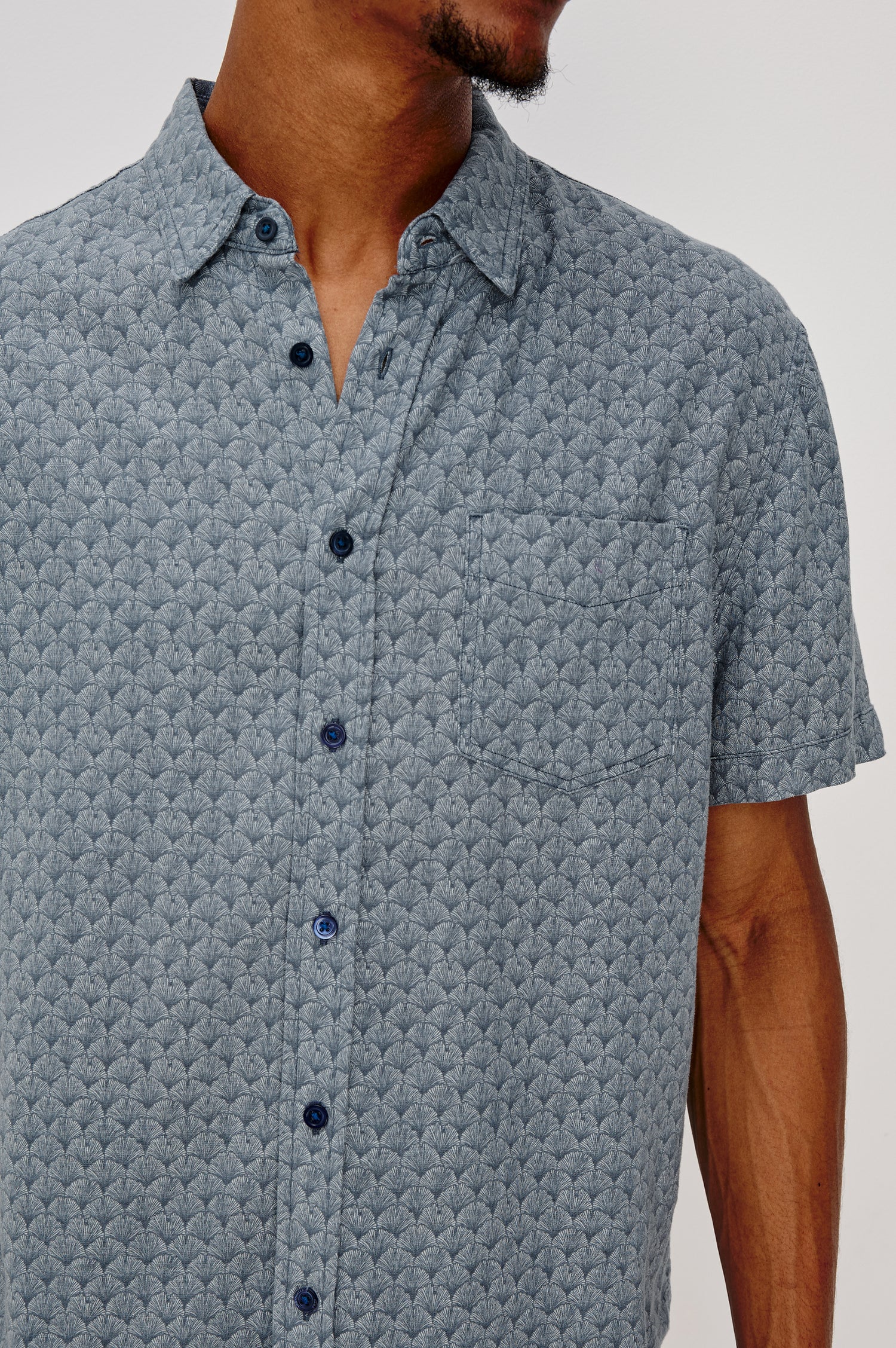 Carson button front collared shirt with short sleeves and a front patch pocket in Ginkgo Blue Ice colorway. Front Detail View Shown on Model.
