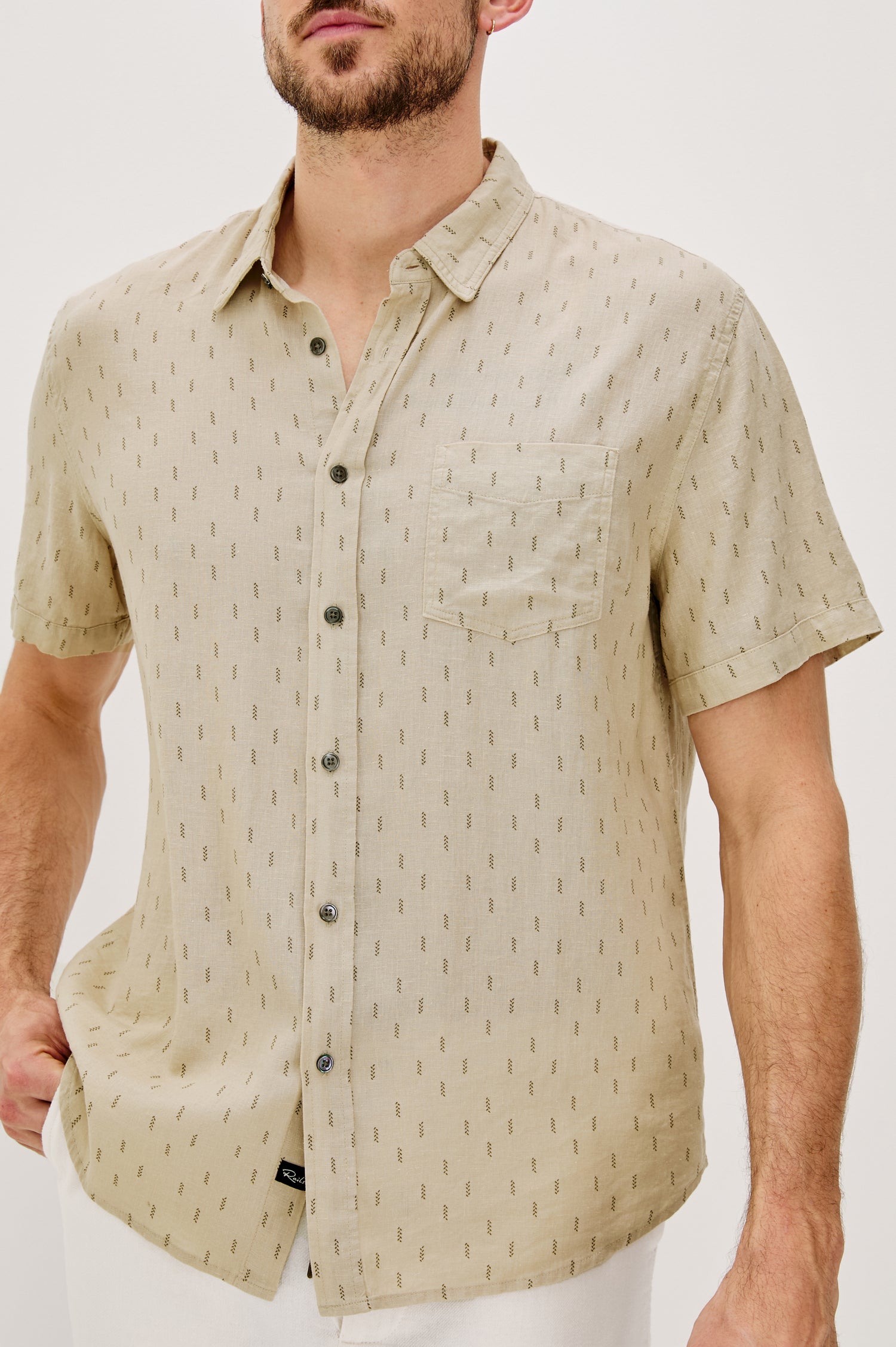 Carson linen short sleeve button down with a collar and front chest pocket in Louis Leaf Khaki colorway - close up of details