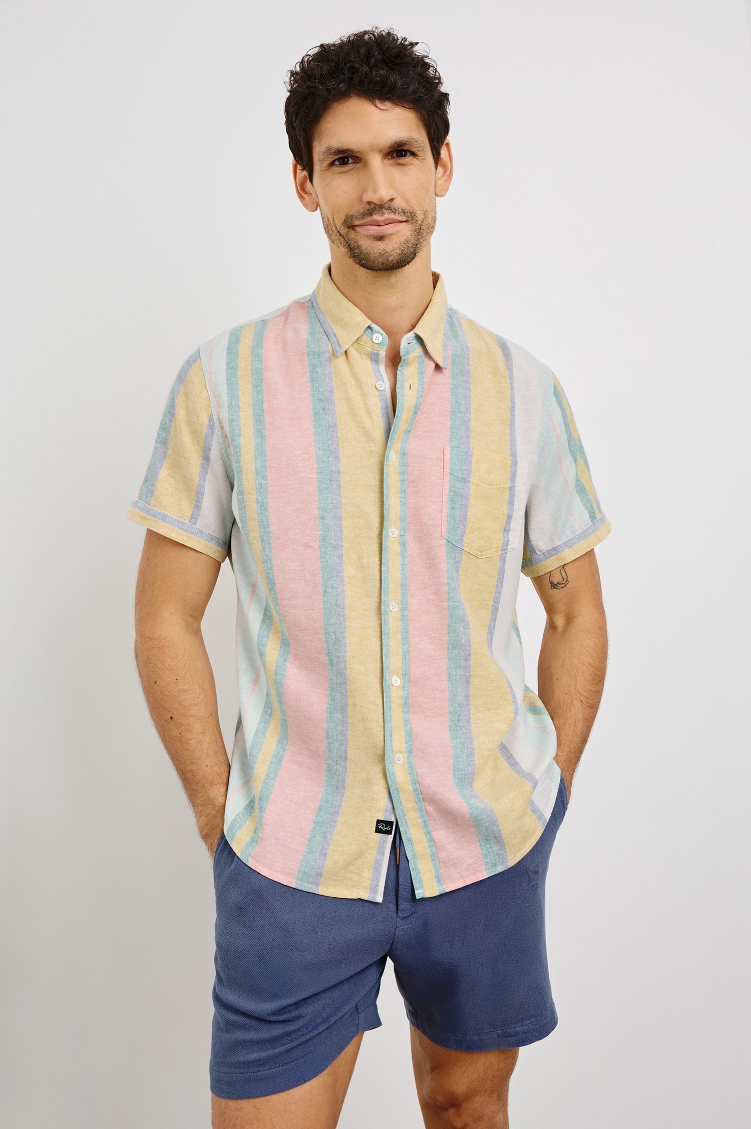 Carson Collared Button Front Shirt with Short Sleeves and a Chest Pocket in Portofino Stripe Colorway. Front View Shown on Model.