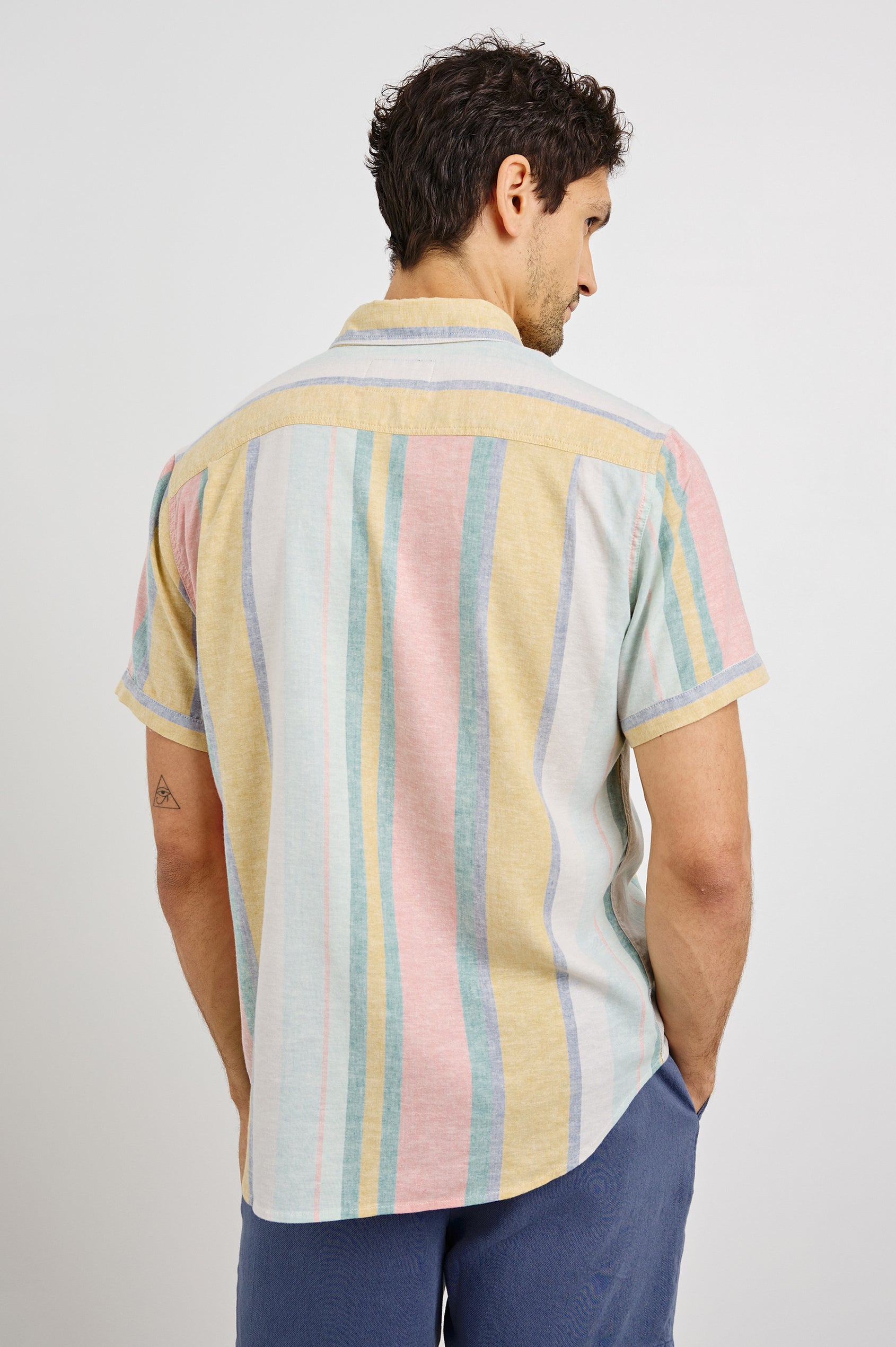 Carson Collared Button Front Shirt with Short Sleeves and a Chest Pocket in Portofino Stripe Colorway. Back View Shown on Model.
