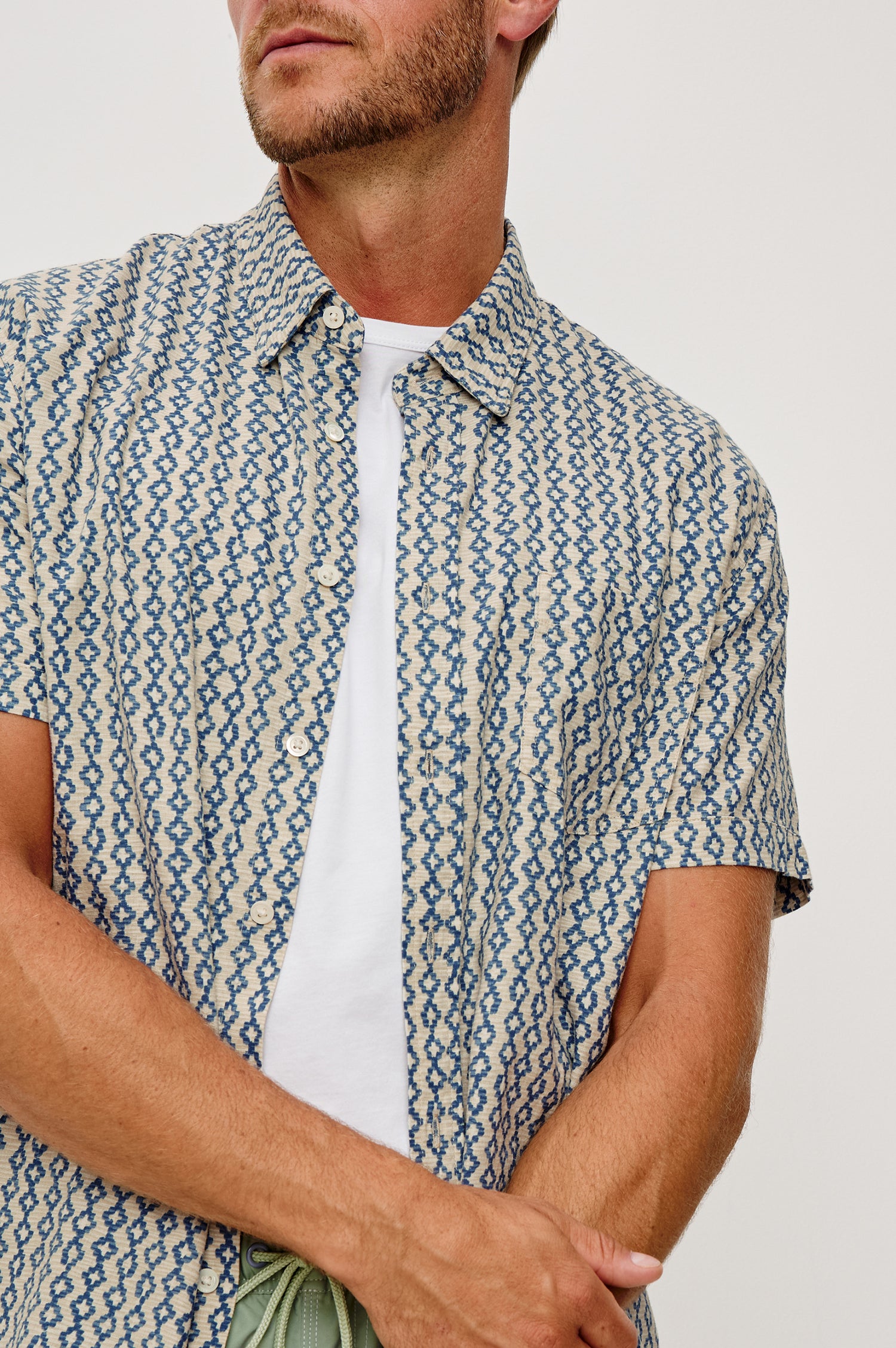 Carson Button-Up Short Sleeve Shirt in Linen Blend With Collar and Classic Fit in Wavy Batik Coast Colorway - Upper Body Close Up Front View Featured on Model