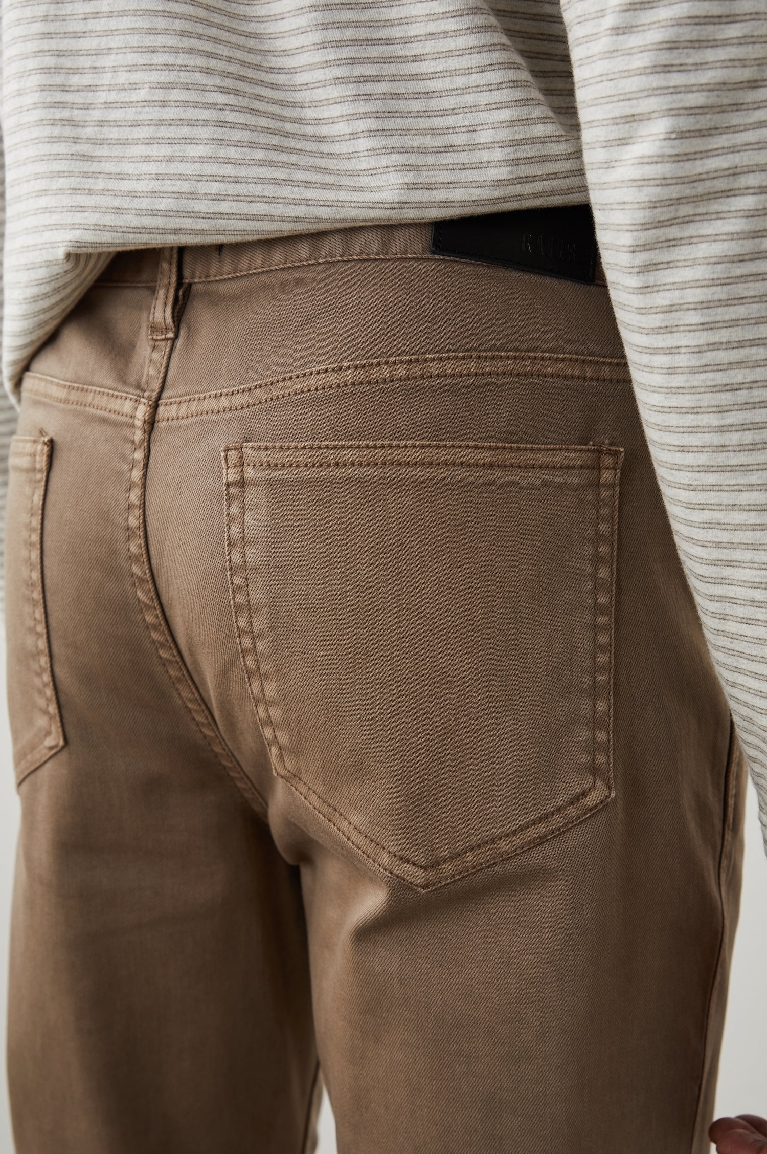Carver Pants with Belt Loops, Two Front Pockets plus a Coin Pocket and Two Back Patch Pockets in Cacao Colorway - Back View Featured on Model