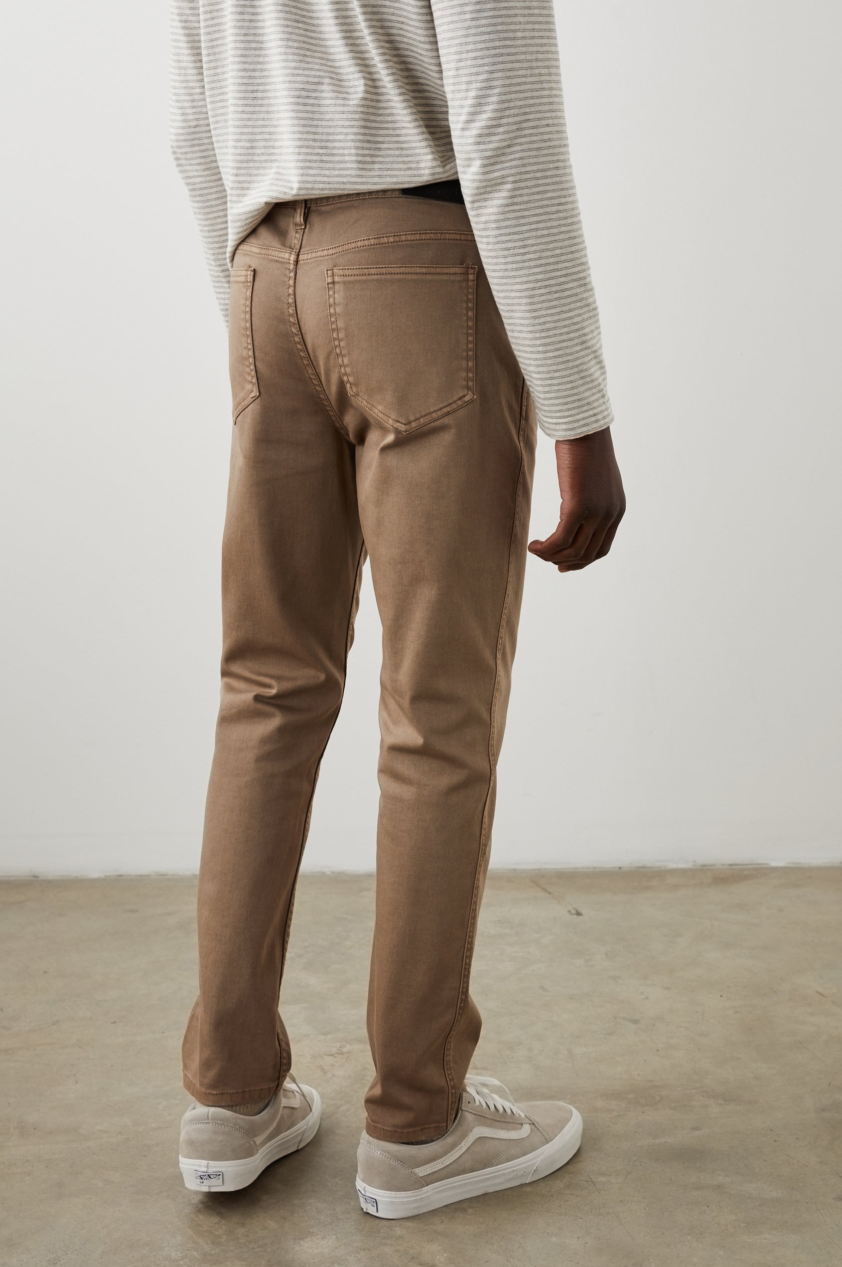 Carver Pants with Belt Loops, Two Front Pockets plus a Coin Pocket and Two Back Patch Pockets in Cacao Colorway - Back View Featured on Model