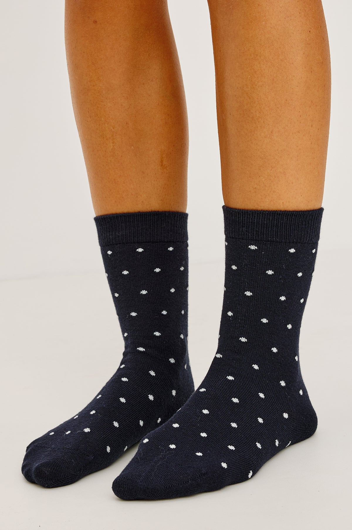 Cashmere Crew Socks in Soft Cotton-Cashmere Blend With Ribbed Cuffs in Navy Polka Dot Colorway - Upper Body Front Detail View Featured on Model.