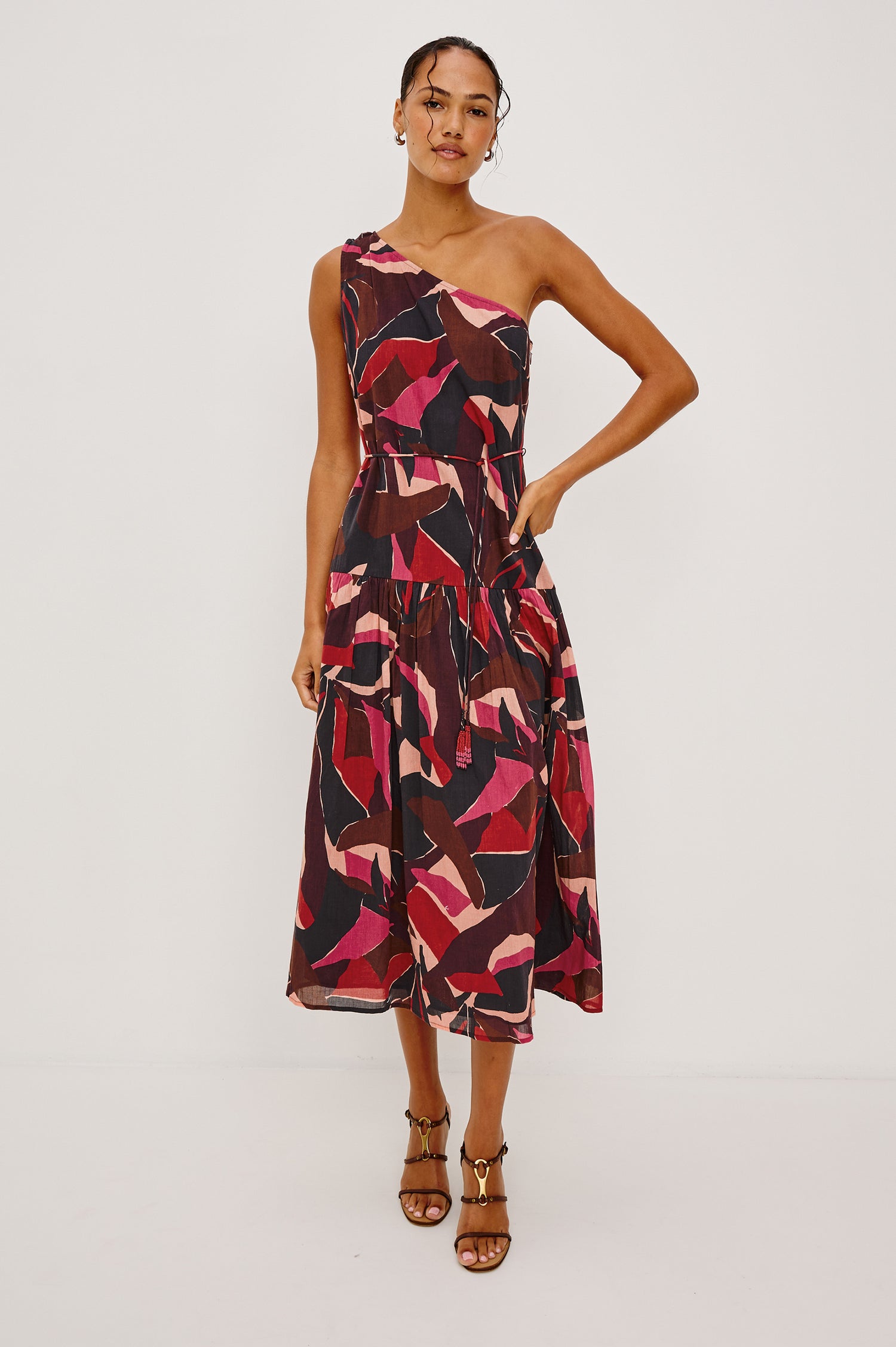 Cecilie Midi Dress in Cotton Voile With One-Shoulder Neckline, Adjustable Waist Ties With Beaded Tassels, Dropwaist Tier Detail, Fully Lined, and Side Zipper Closure in Paradise Colorway - Full Body Front View Featured on Model