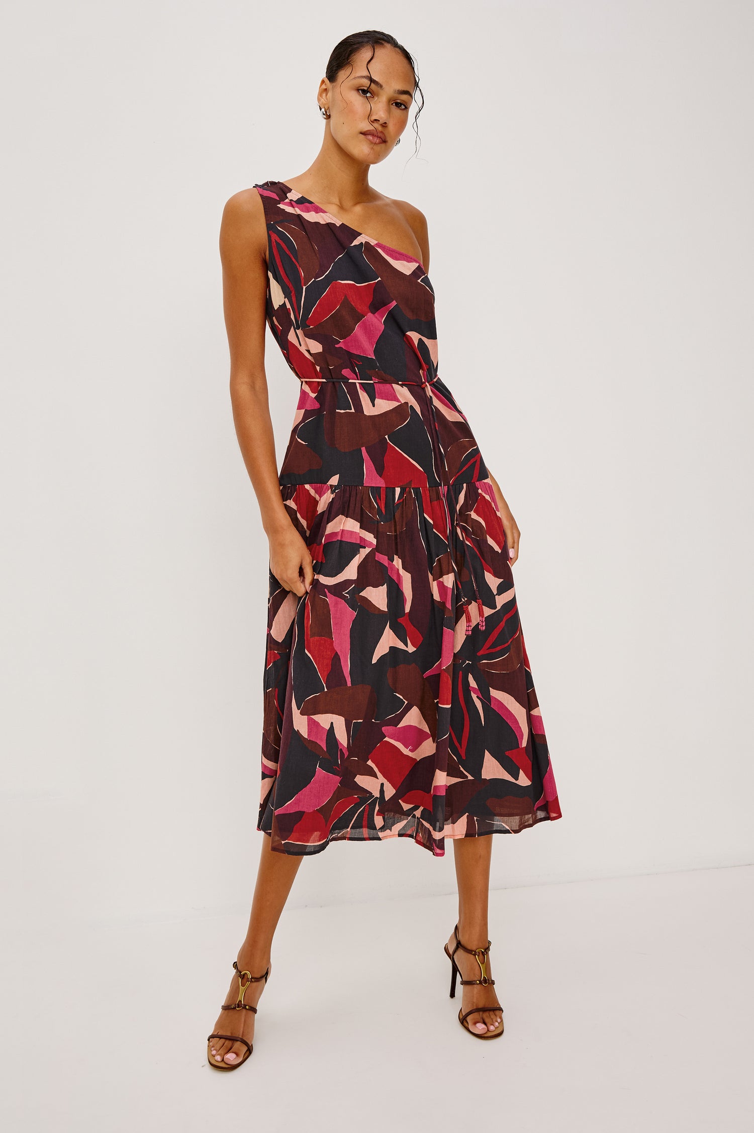 Cecilie Midi Dress in Cotton Voile With One-Shoulder Neckline, Adjustable Waist Ties With Beaded Tassels, Dropwaist Tier Detail, Fully Lined, and Side Zipper Closure in Paradise Colorway - Full Body Front View Featured on Model