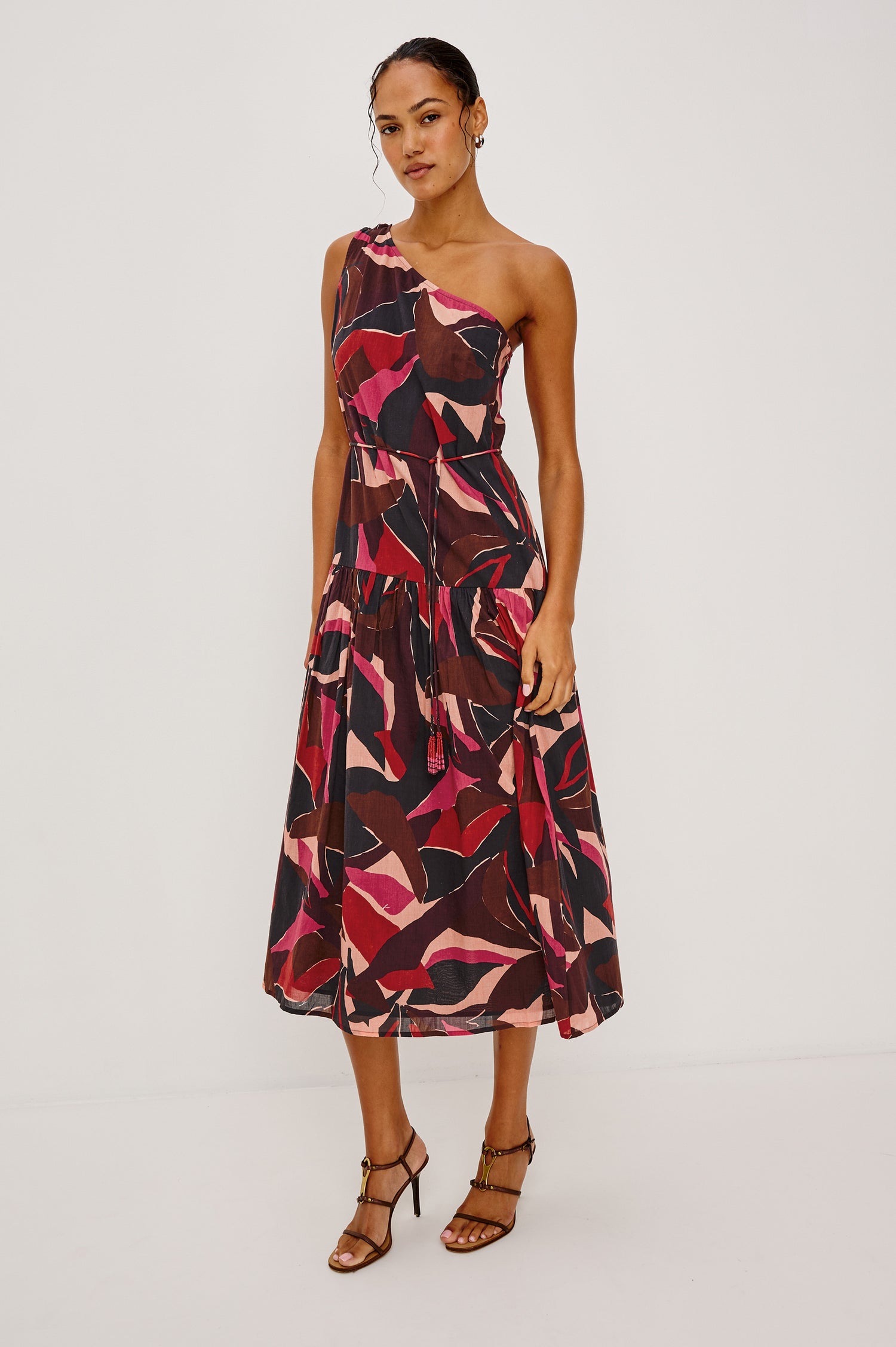 Cecilie Midi Dress in Cotton Voile With One-Shoulder Neckline, Adjustable Waist Ties With Beaded Tassels, Dropwaist Tier Detail, Fully Lined, and Side Zipper Closure in Paradise Colorway - Full Body Front View Featured on Model