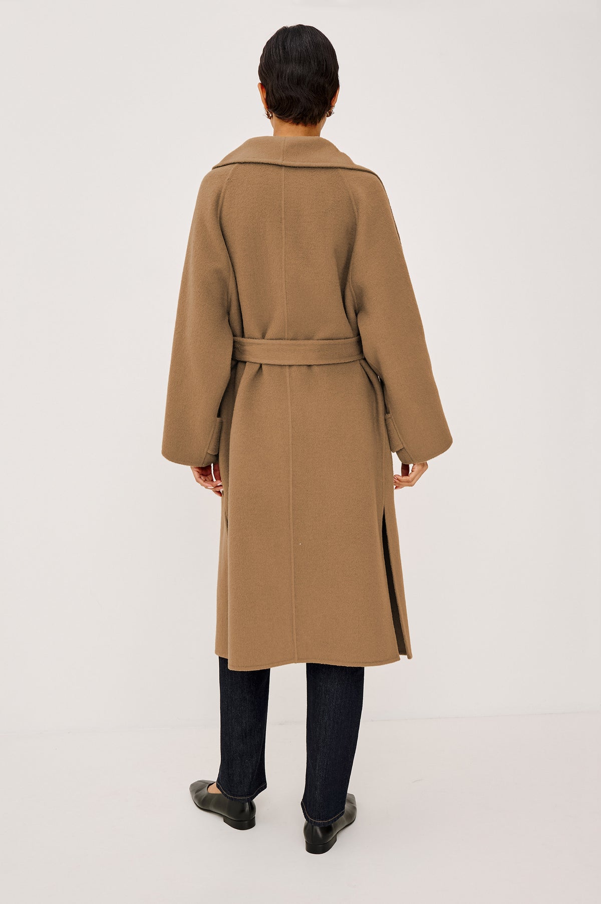 Celeste Coat in Heavy Wool Blend With Shawl Collar, Full Length, Self-Belted Waist, Side Pockets, Button-Tab Cuffs, and Half-Lined Interior in Camel Colorway - Full Body Back View Featured on Model