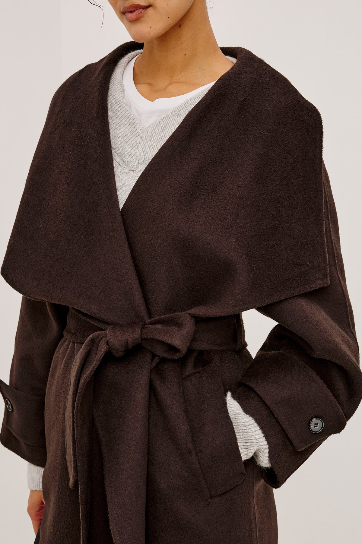 Celeste Coat in Heavy Wool Blend With Shawl Collar, Full Length, Self-Belted Waist, Side Pockets, Button-Tab Cuffs, and Half-Lined Interior in Chocolate Colorway - Mid Body Front View Featured on Model