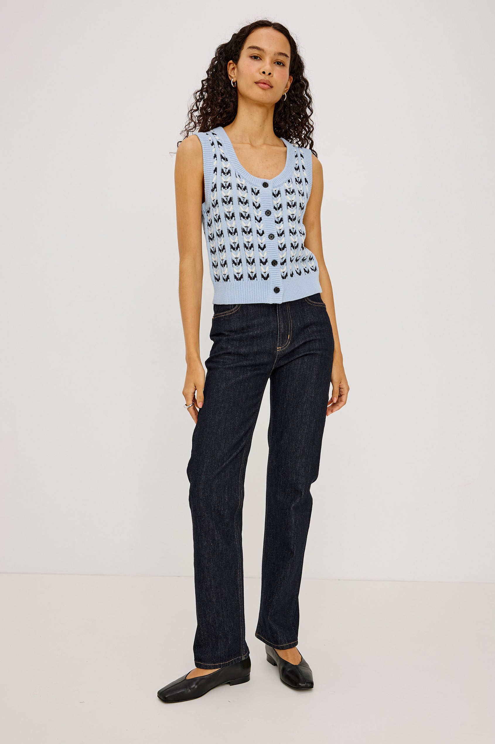 Chance Vest in Cable Knit With Scoop Neckline, Sleeveless Design, Front Button Closures, and Relaxed Fit in Sky Blue Colorway - Full Body Front View Featured on Model