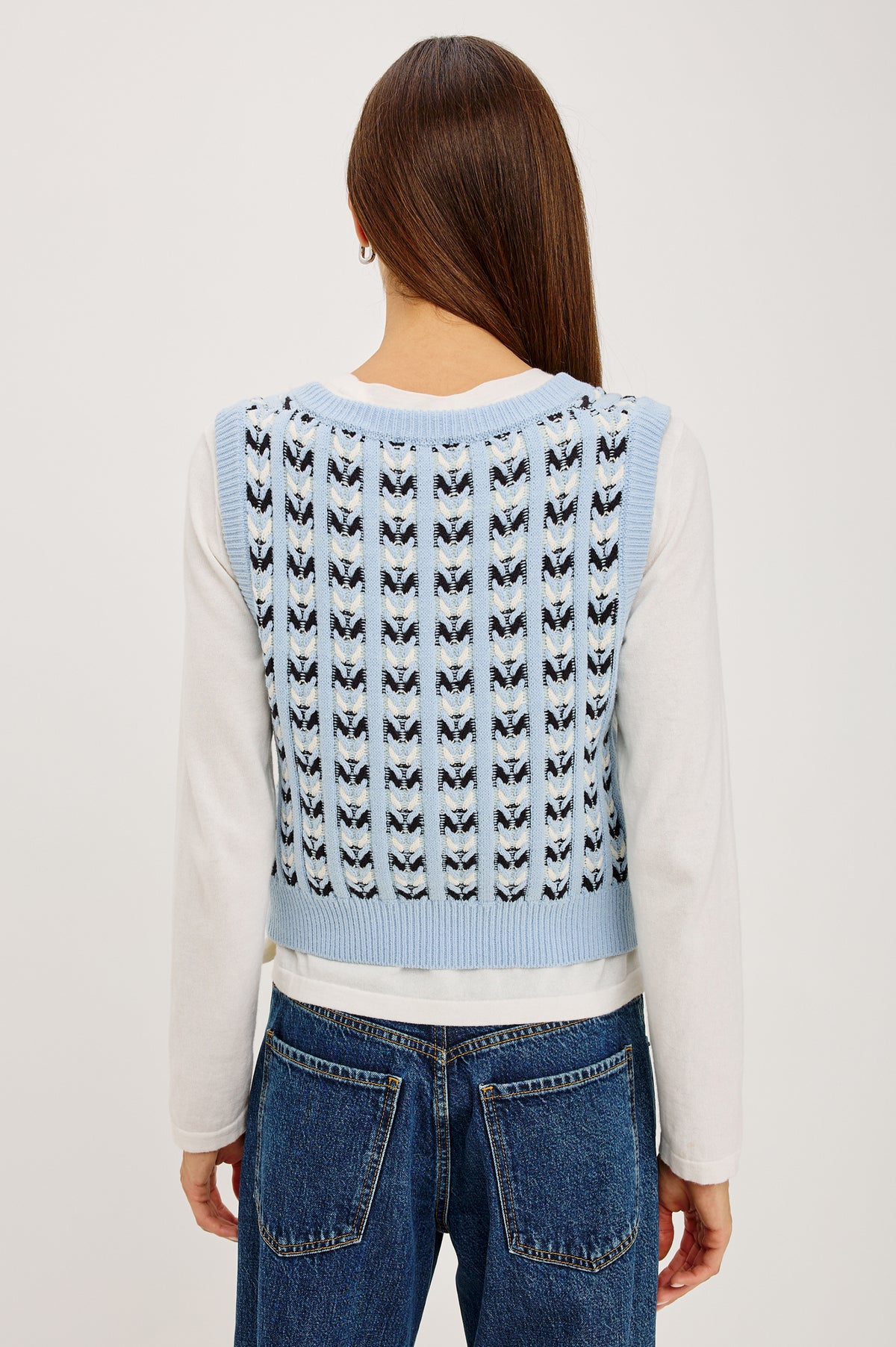 Chance Vest in Cable Knit With Scoop Neckline, Sleeveless Design, Front Button Closures, and Relaxed Fit in Sky Blue Colorway - Upper Body Back View Featured on Model