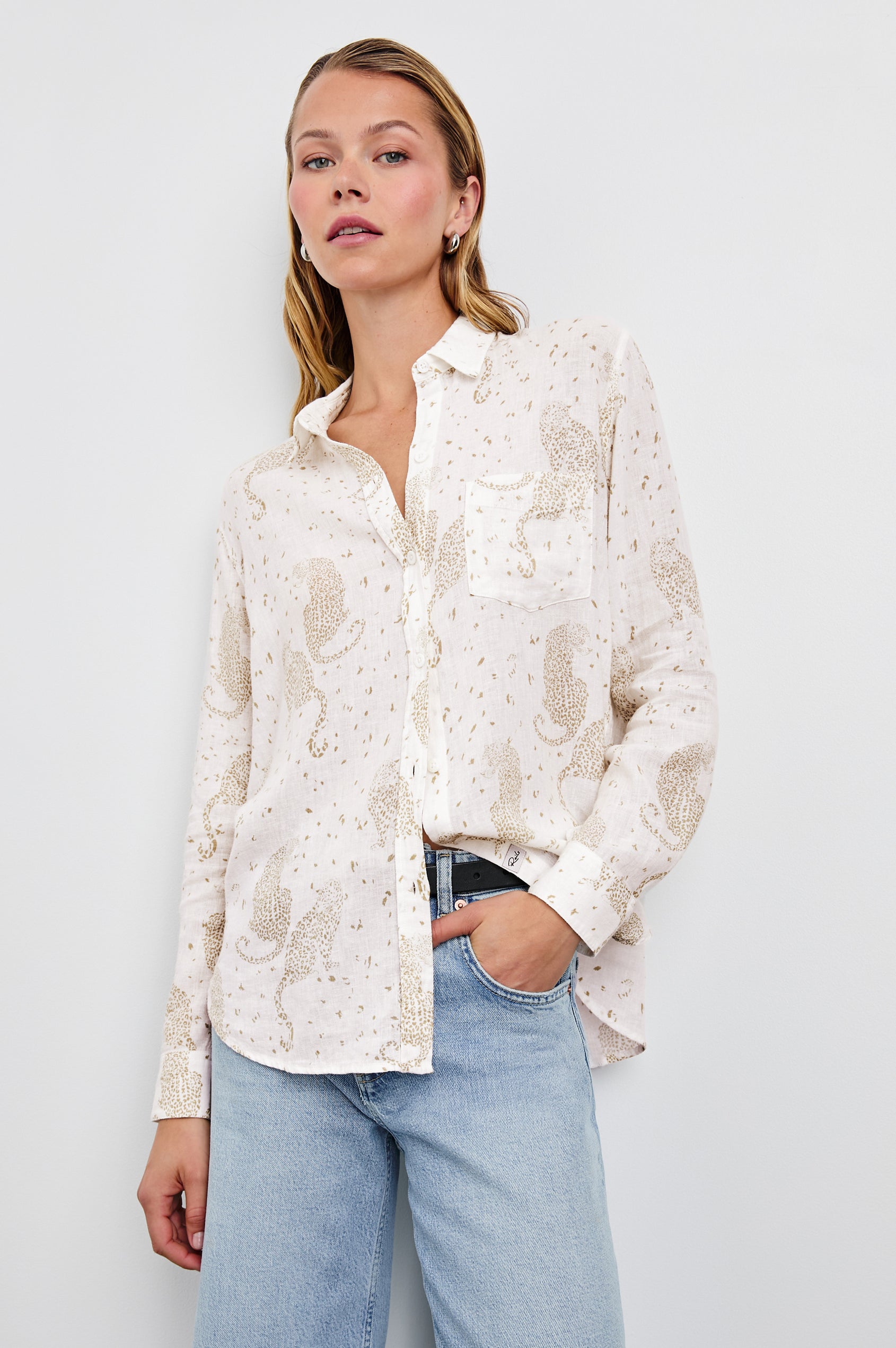 Charli Long-Sleeve Button up with a Chest Patch Pocket in Cheetah Spots Colorway, with brown spots and cheetahs on cream - Front View Featured on Model