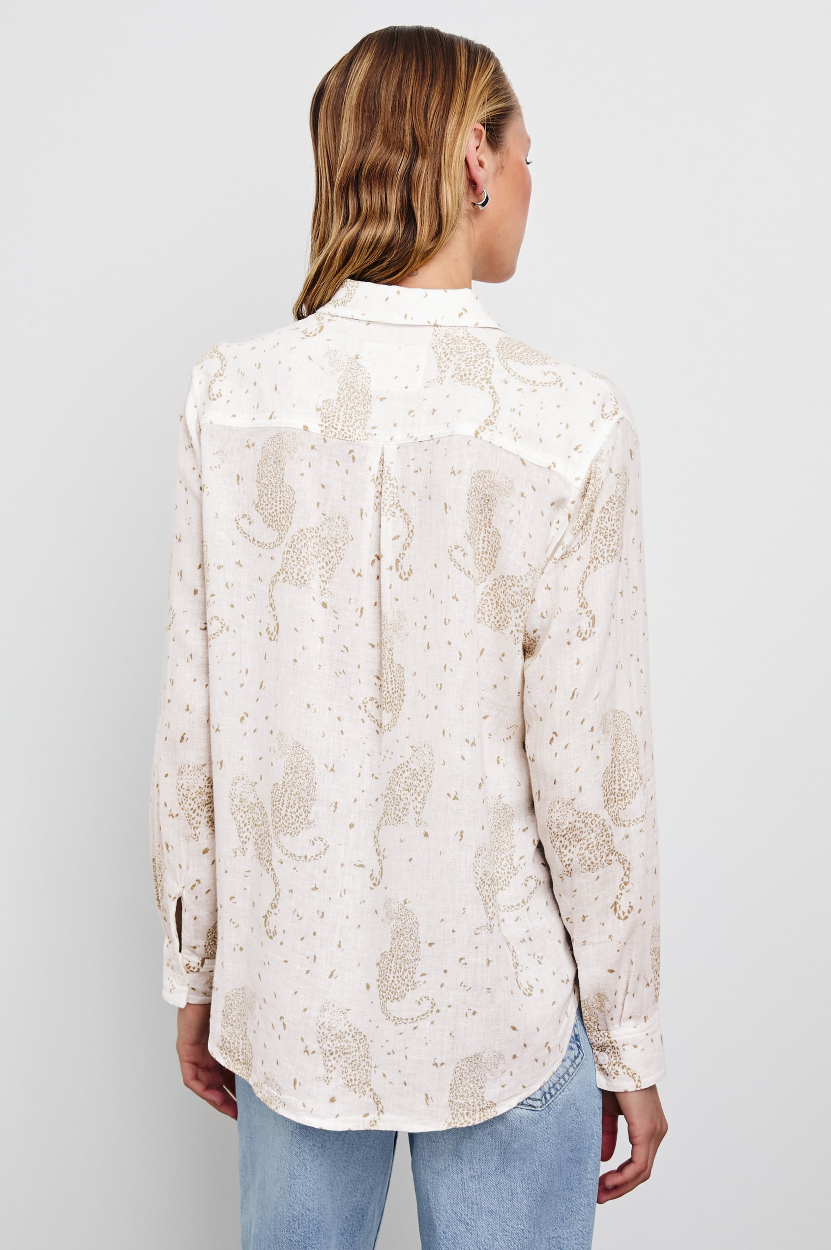 Charli Long-Sleeve Button up with a Chest Patch Pocket in Cheetah Spots Colorway, with brown spots and cheetahs on cream - Back View Featured on Model