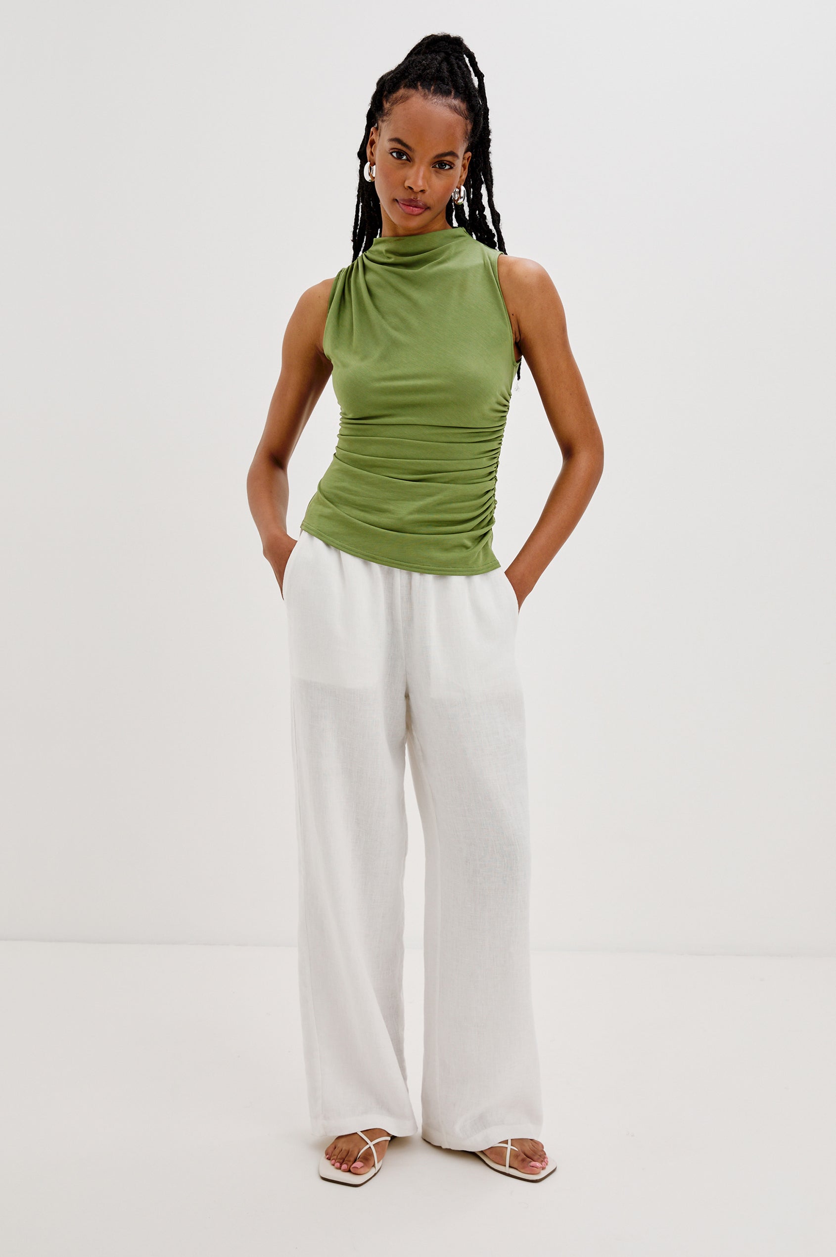 Christen High Cowl Neck Tank Top with Gathering at Shoulder Seam and Left Side Seam in Dill Colorway. Full Body Front View Shown on Model.