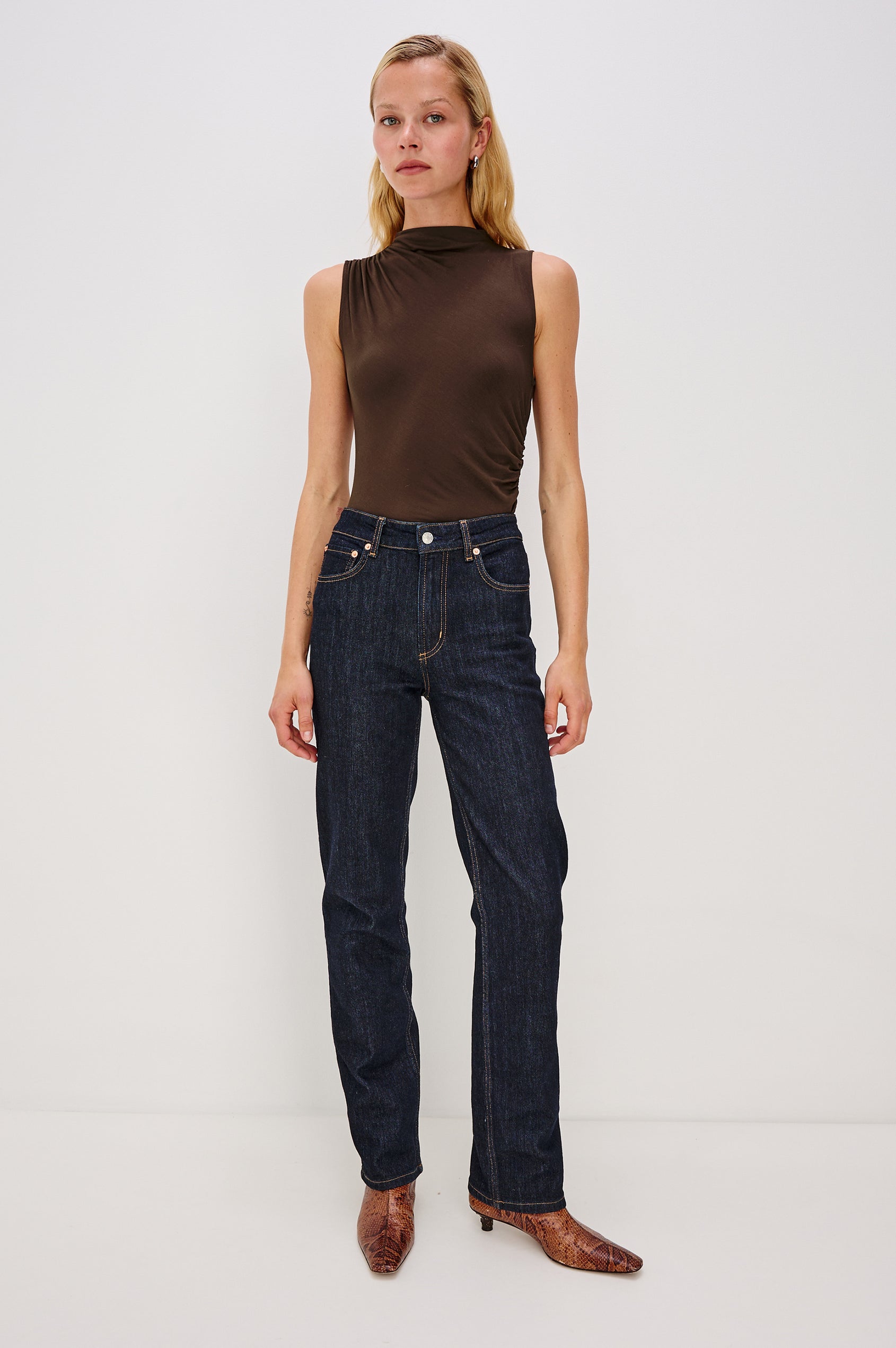 Christen Sleeveless Top with a Mock Neck and Ruching Along One Side Seam in Espresso Colorway - Full Body Front View Featured on Model