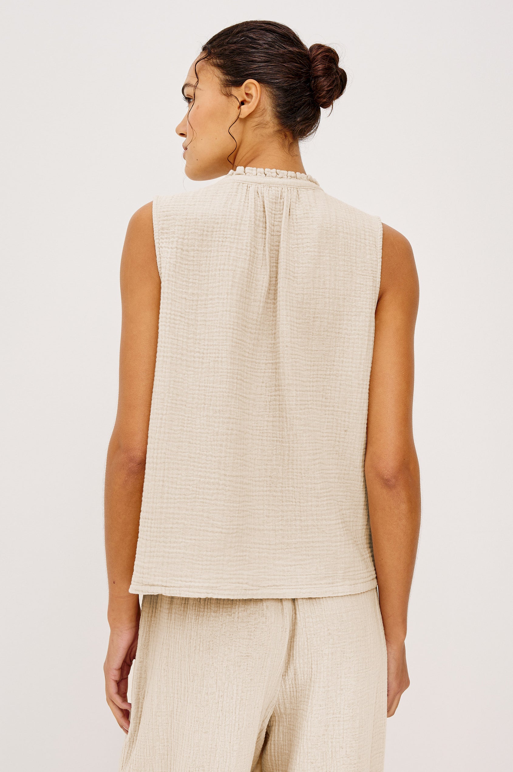 Christy Cotton Gauze Sleeveless Top with Collared V-Neck In Colorway Light Brown Heather Flax Colorway - Upper Body Back View Featured On Model