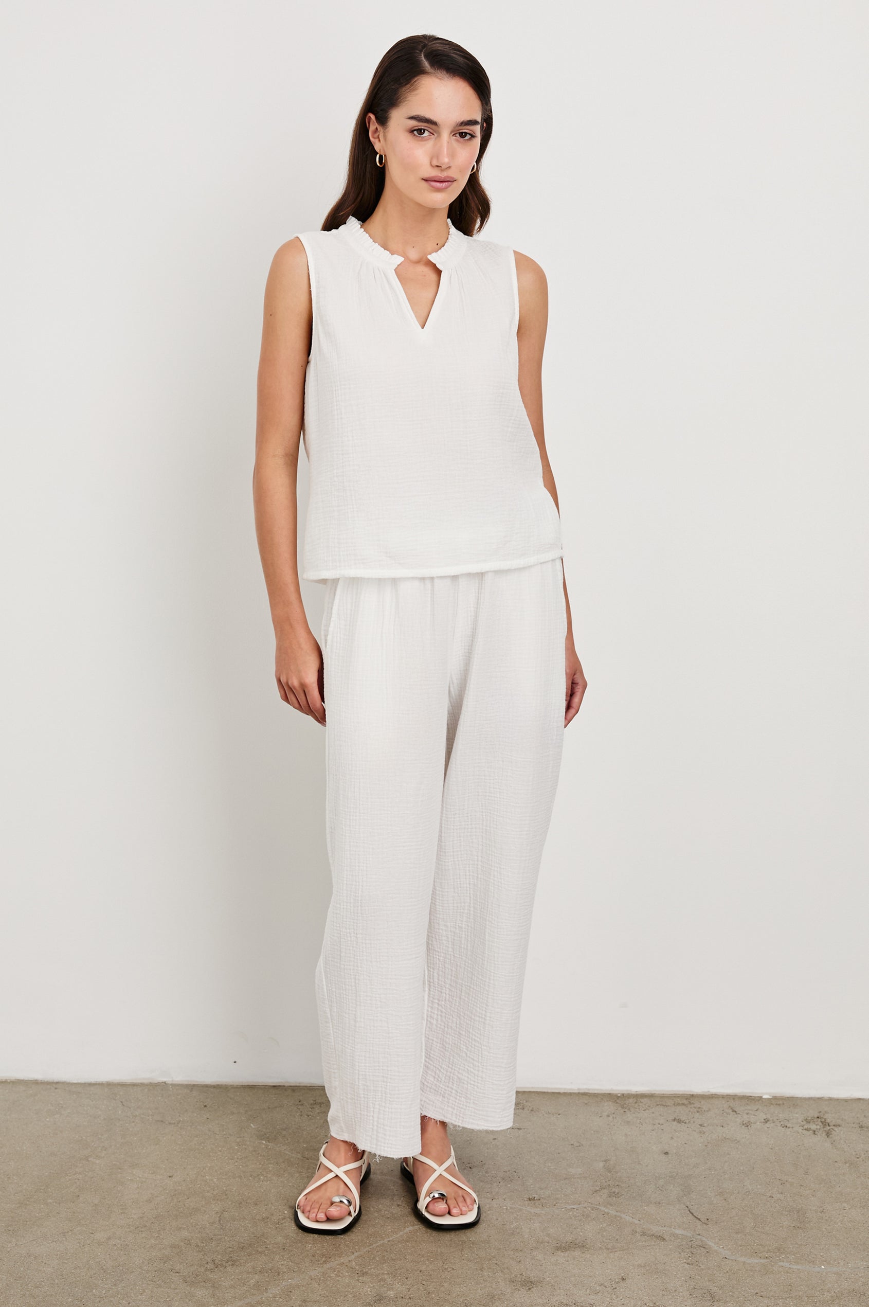 Christy Cotton Gauze Sleeveless Top with Collared V-Neck In Colorway White - Full Front Body View Featured On Model