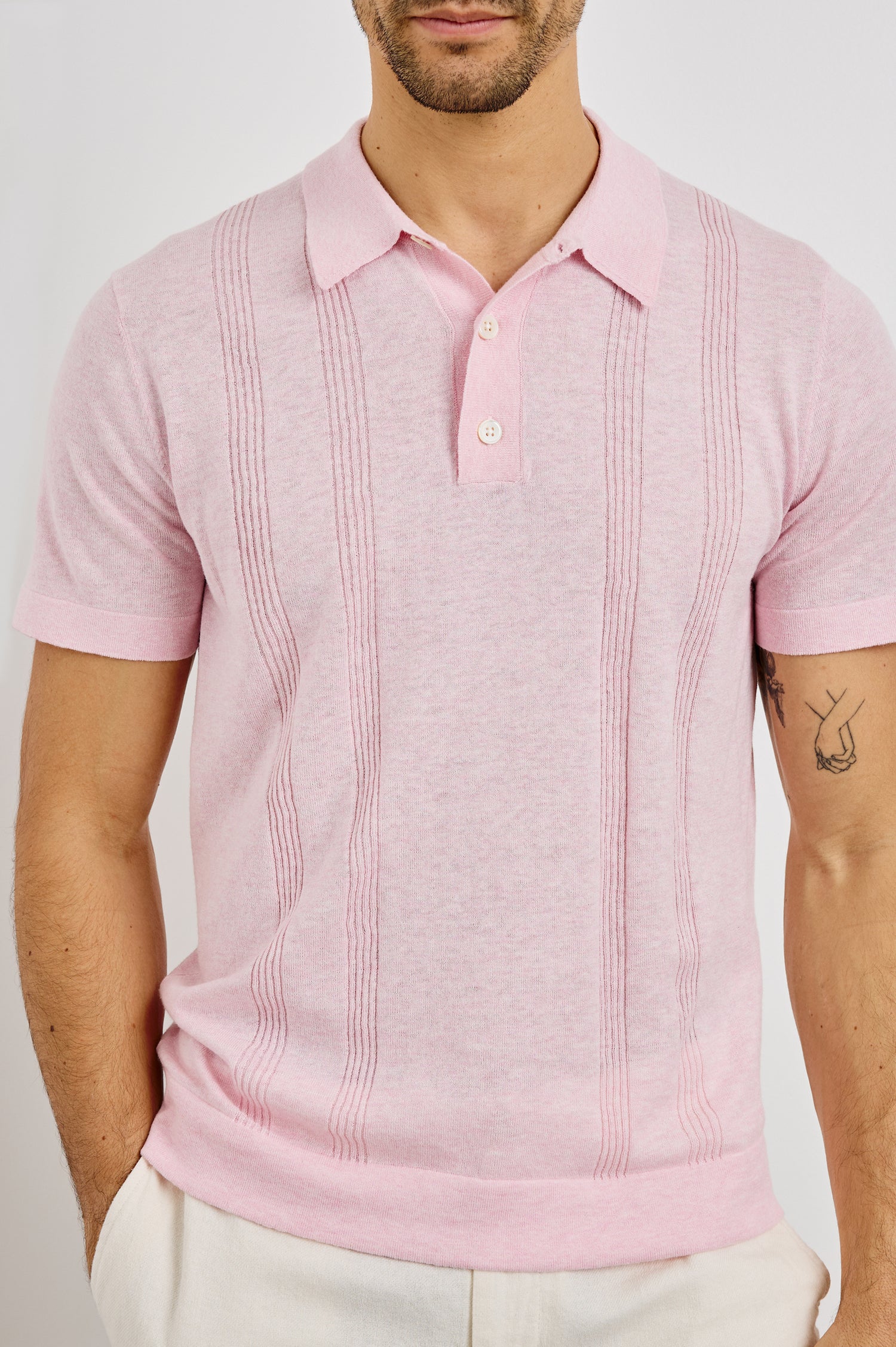 Cillian 3-Button Polo with Short Sleeves in Pink Colorway. Front View Shown on Model.