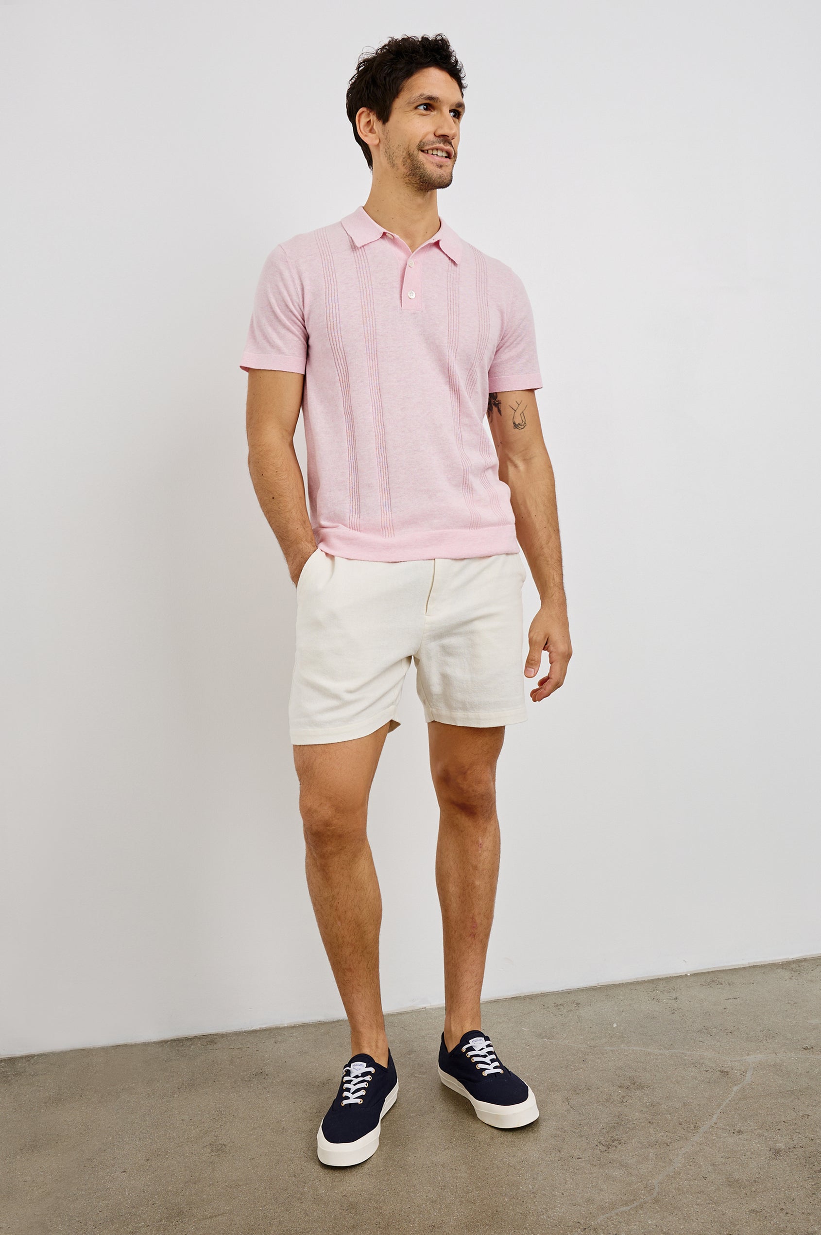 Cillian 3-Button Polo with Short Sleeves in Pink Colorway. Front View Shown on Model.