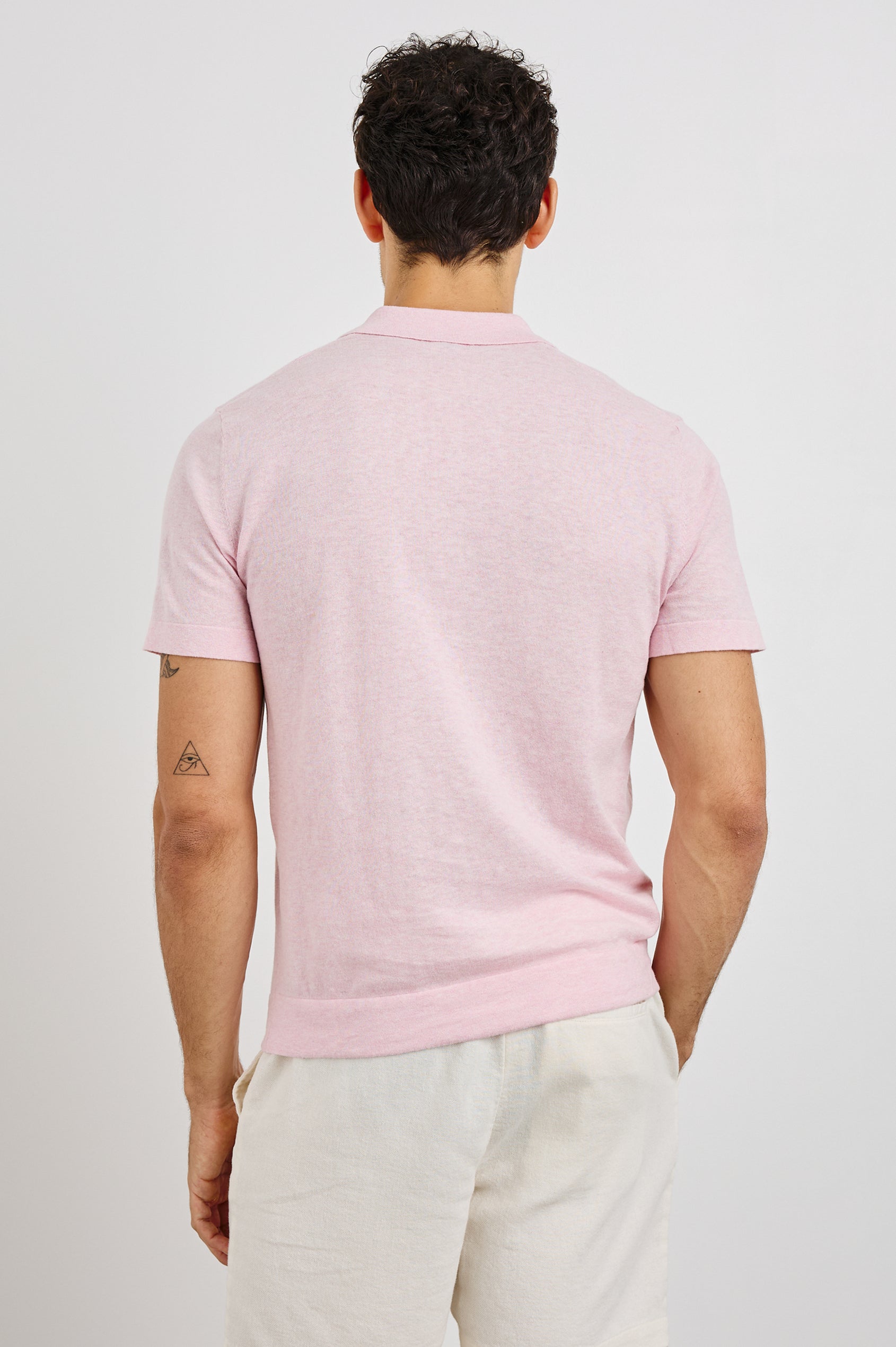 Cillian 3-Button Polo with Short Sleeves in Pink Colorway. Back View Shown on Model.