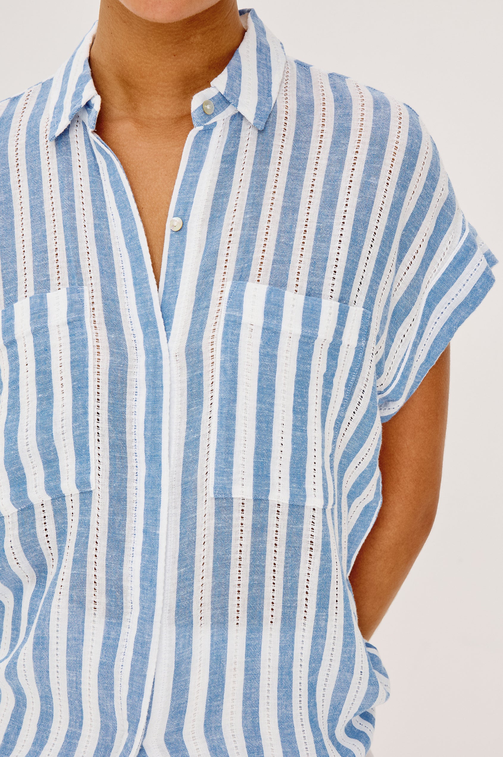 Cito Relaxed Button-Up Shirt in Luxe Linen With Collar, Chest Patch Pockets, and Cuffed Cap Sleeves in Atlantis Stripe Colorway - Upper Body Close Up Front View Featured on Model