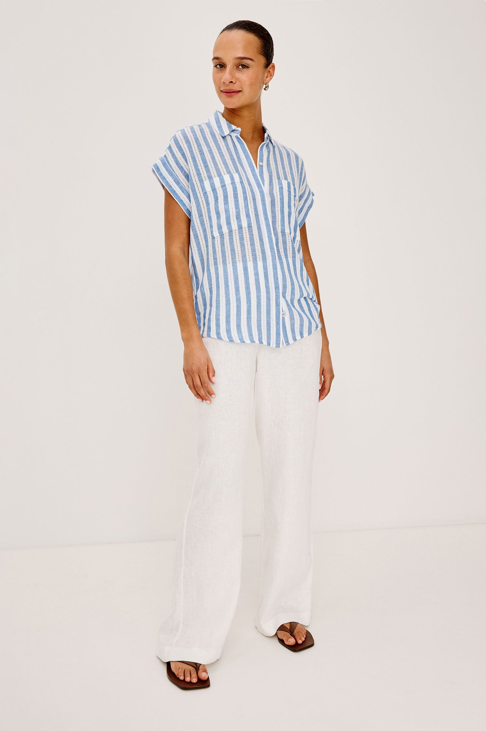 Cito Relaxed Button-Up Shirt in Luxe Linen With Collar, Chest Patch Pockets, and Cuffed Cap Sleeves in Atlantis Stripe Colorway - Full Body Front View Featured on Model